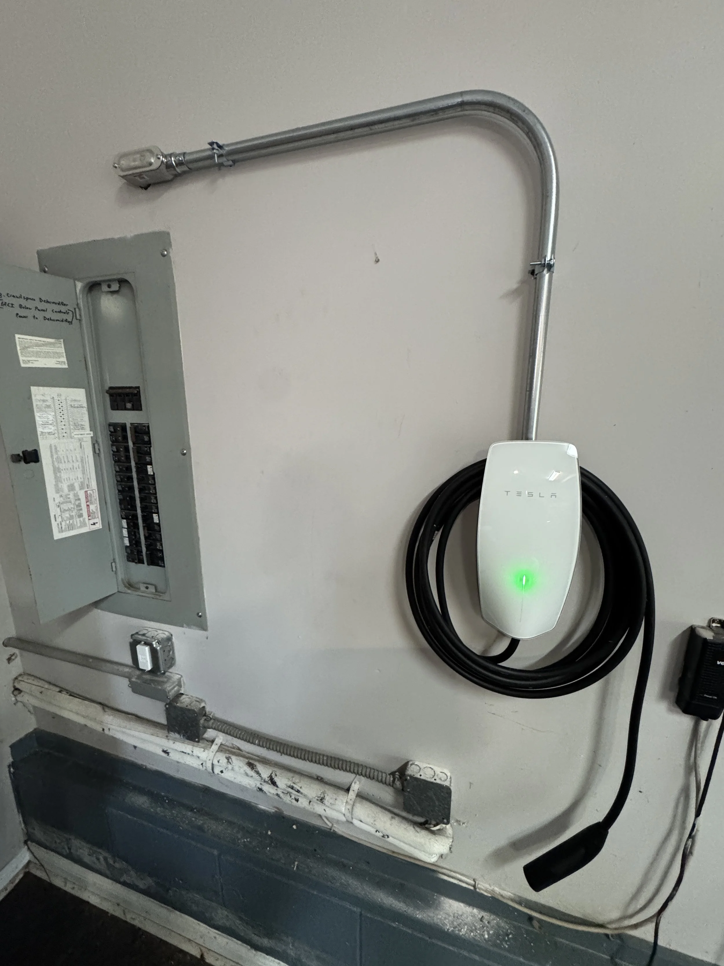 Charger status indicator checked against the panel on a Suffolk, VA repair visit