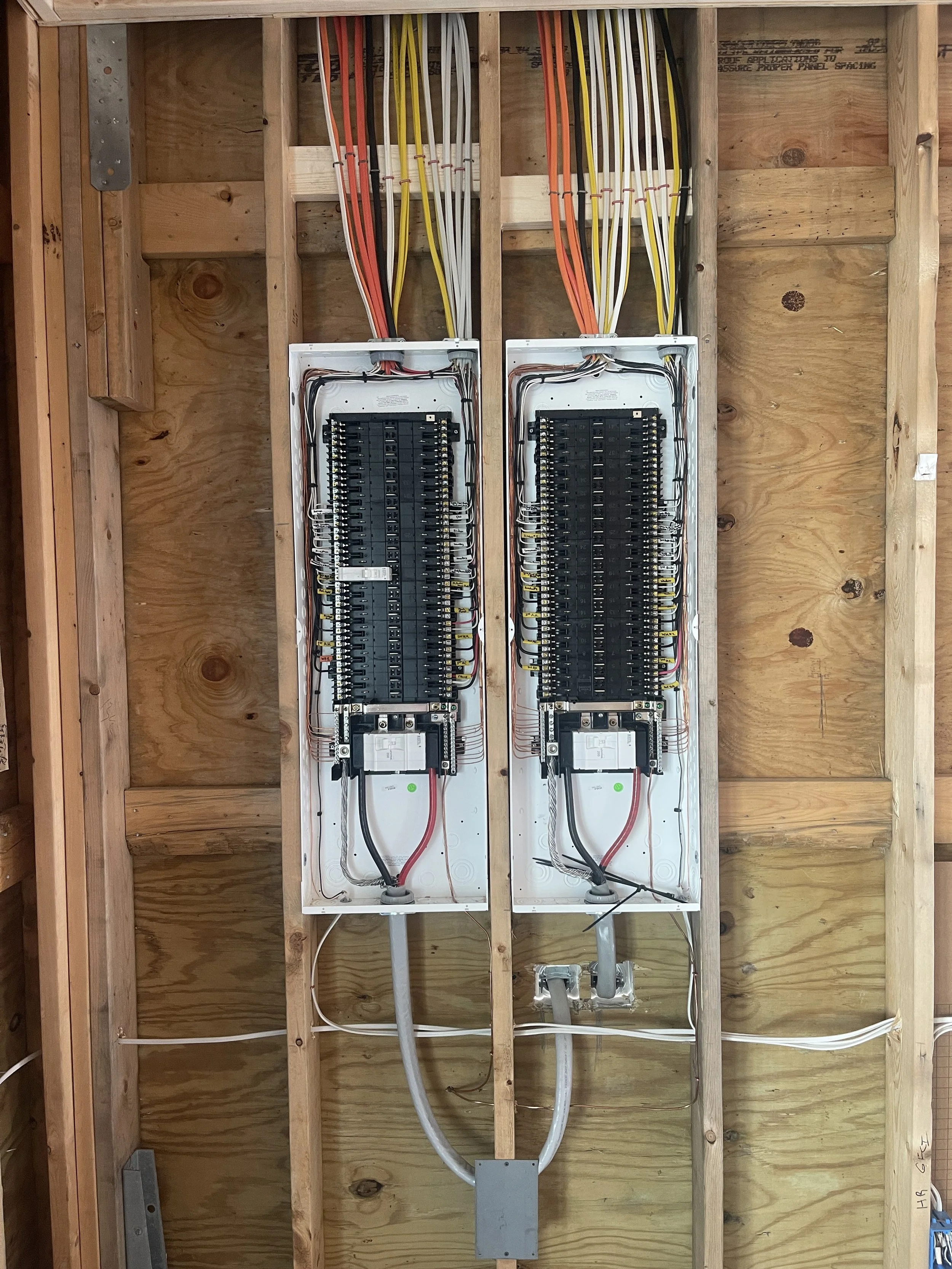 Panels set on open framing before the walls close in a Norfolk, VA remodel