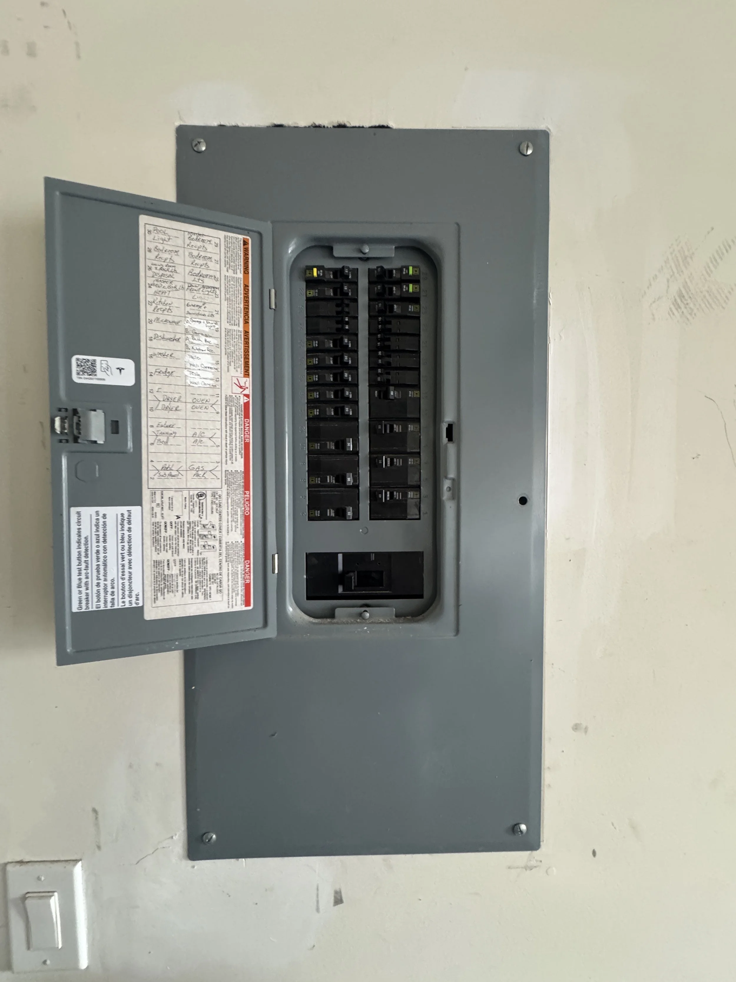 Open panel and its breaker directory at a Suffolk, VA home