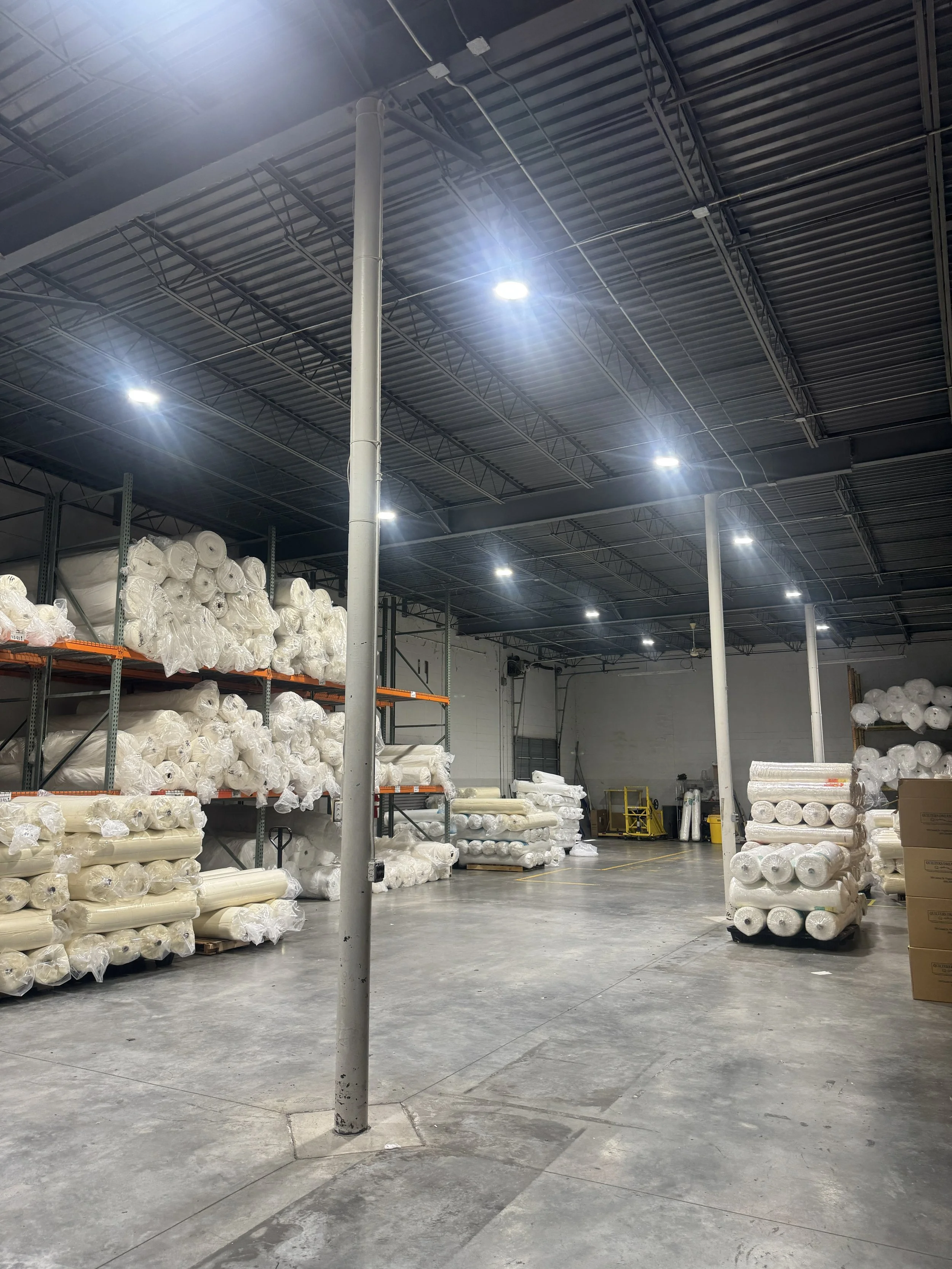 Finished commercial interior under newly fitted high-bay lighting