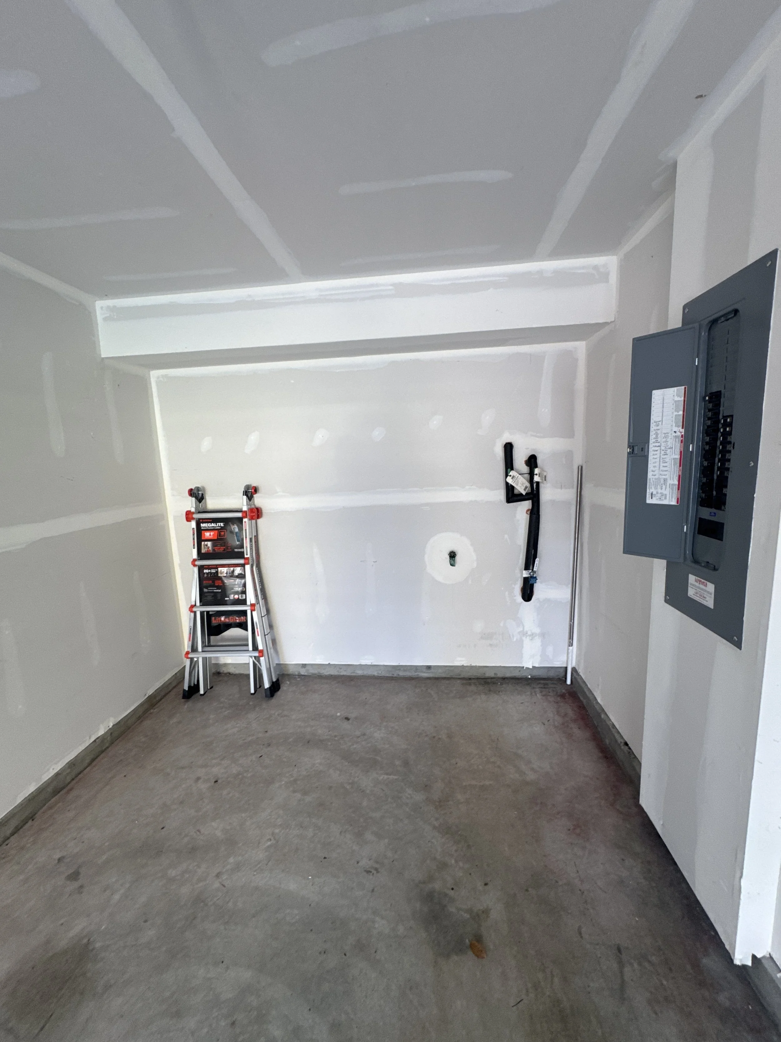 Remodelled Norfolk, VA room drywalled around its panel