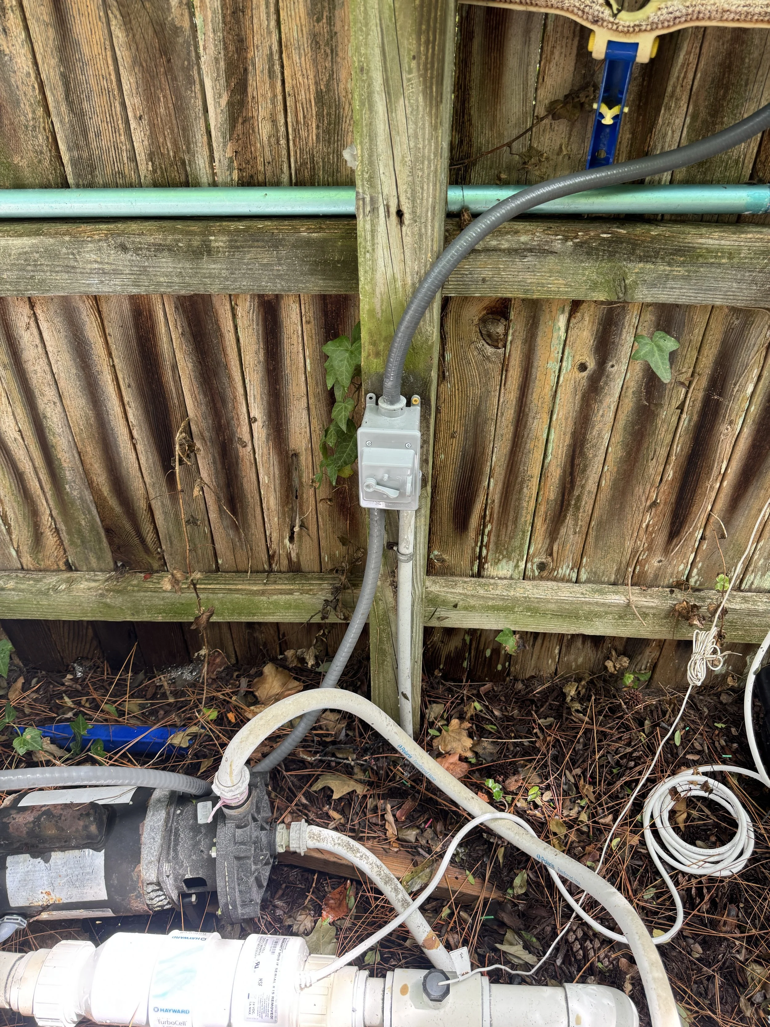 Pool equipment and its control gear set back from the barrier at a Norfolk, VA home