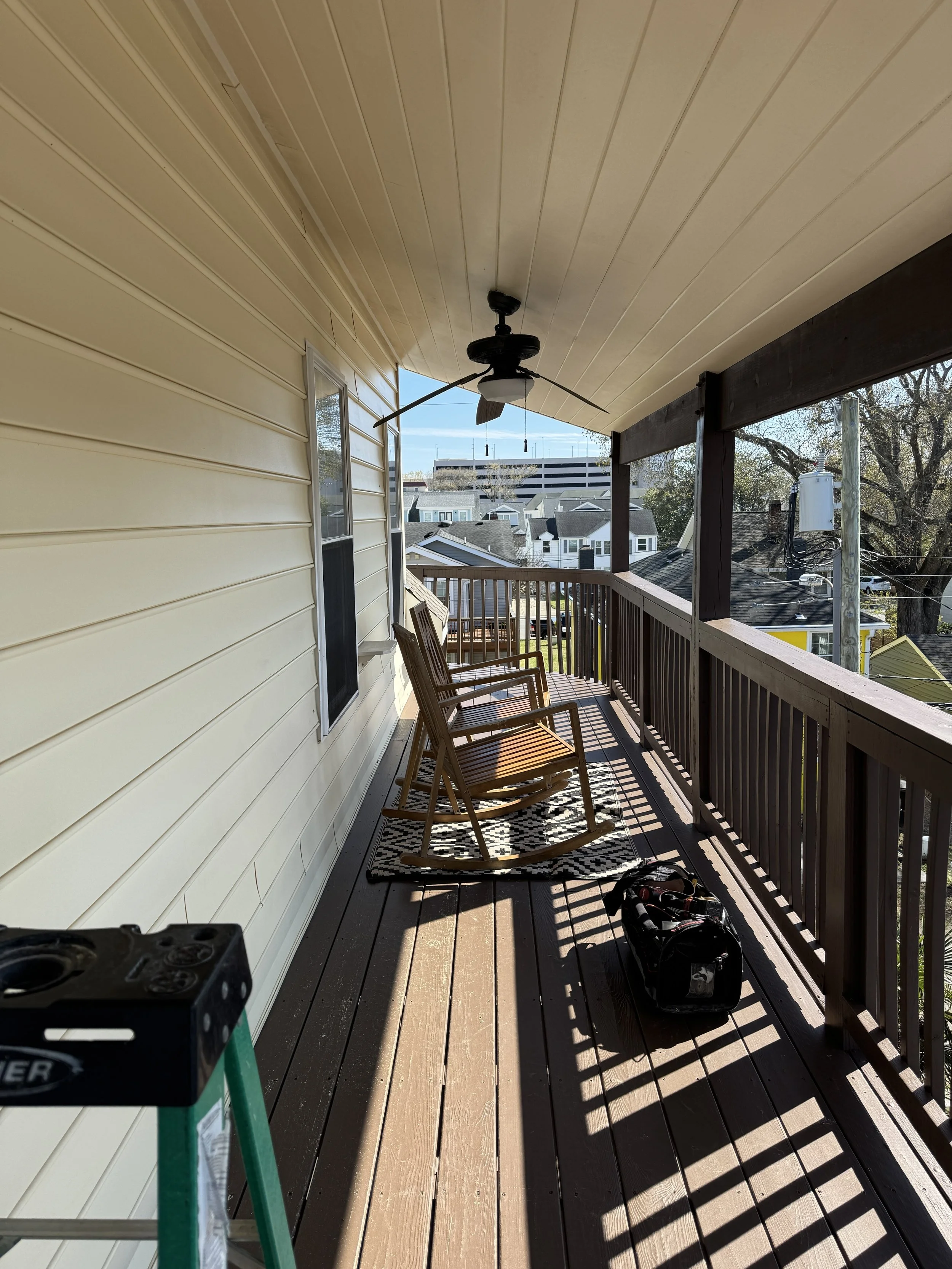 Ceiling fan light fixture on the covered porch of a Portsmouth, VA home