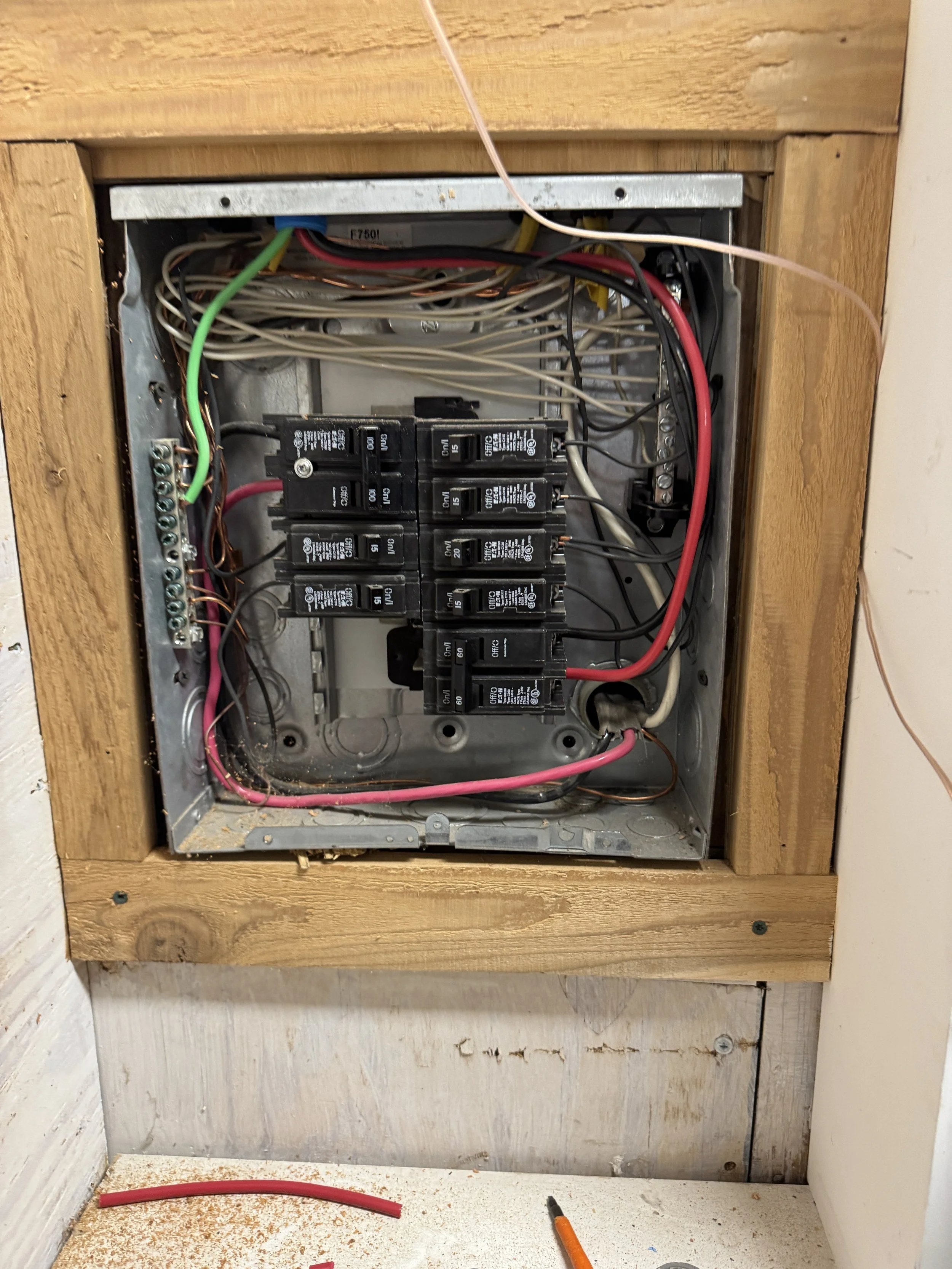 Old panel opened up in the framing of an older Suffolk, VA house