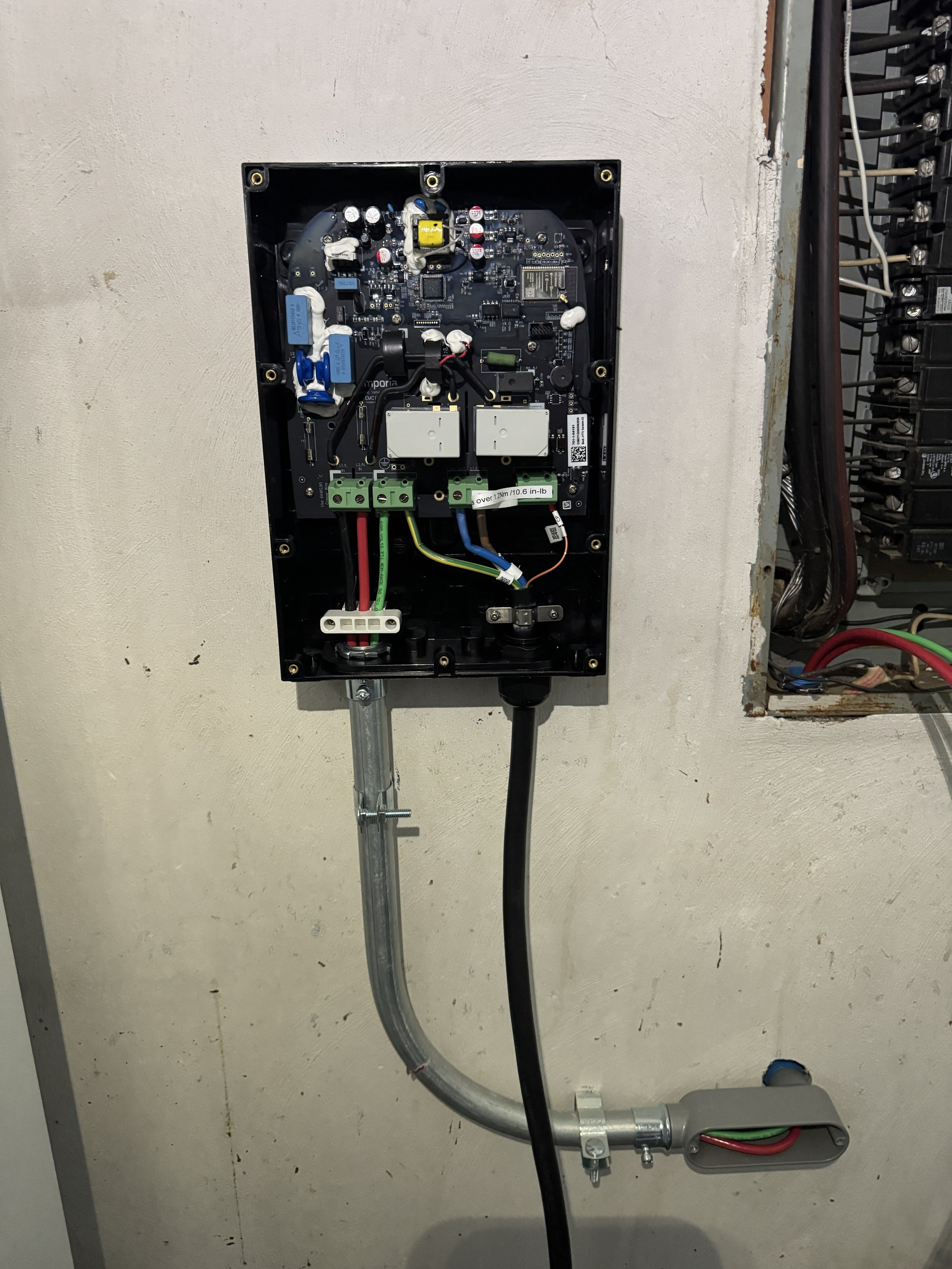 Device wired in beside the panel that feeds hardwired equipment in a Norfolk, VA home