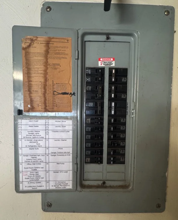 Label card inside the door of a residential panel in a Chesapeake, VA home