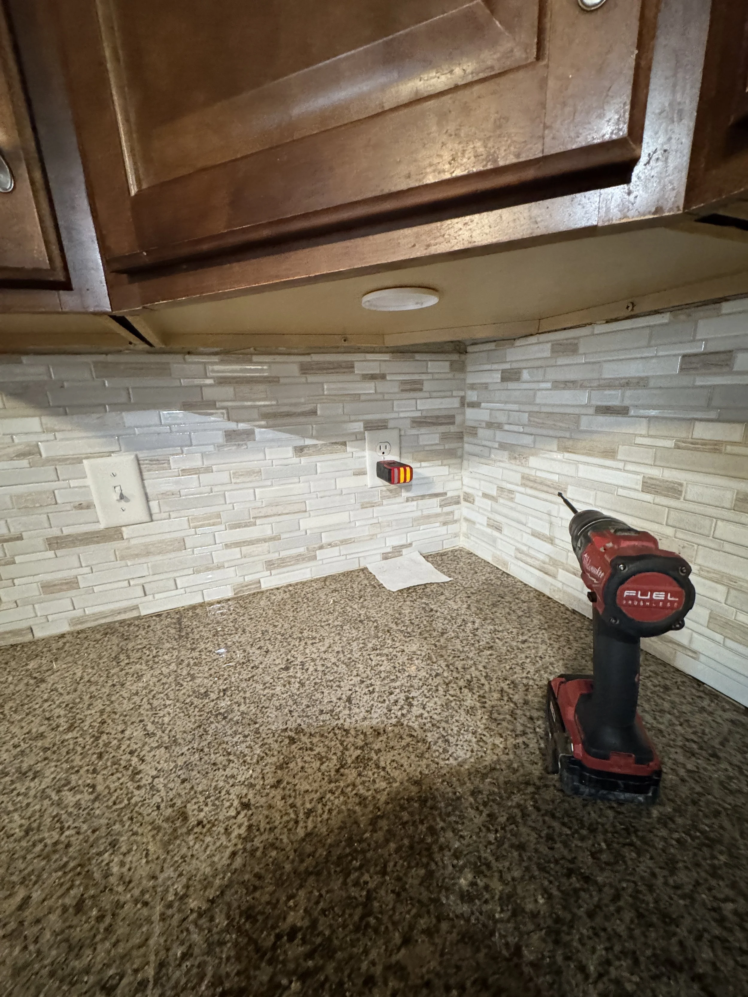 Kitchen receptacle being fitted during a Chesapeake, VA appliance circuit job