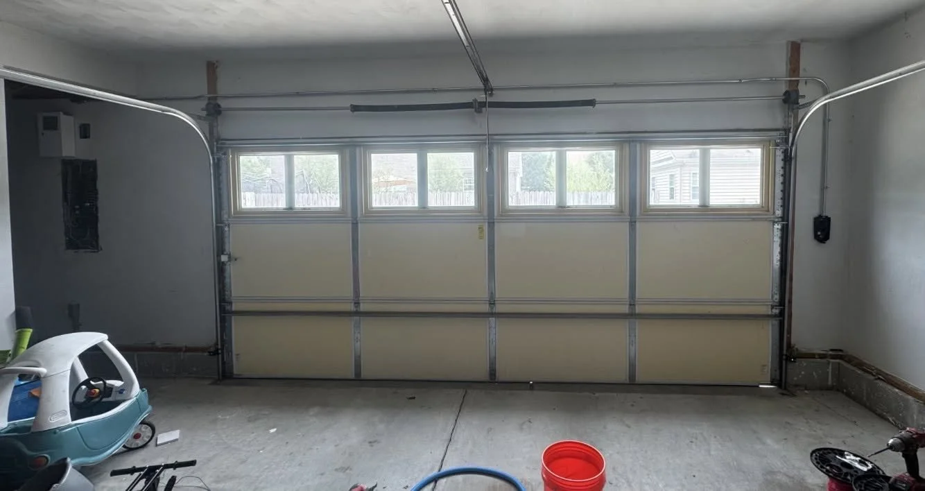 Garage interior on a Portsmouth, VA lot before it is converted to living space