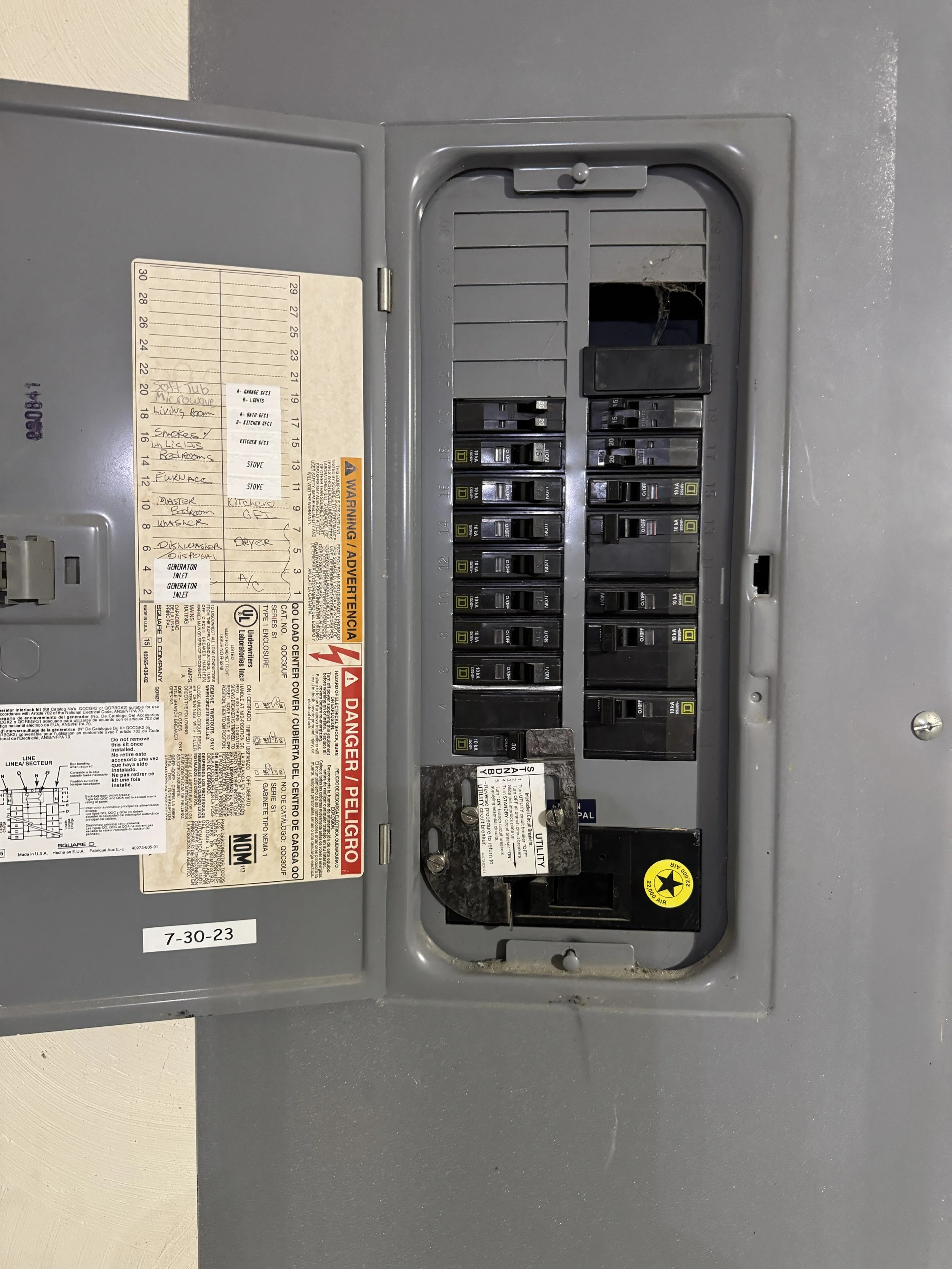 Breaker panel opened to pick the circuits a Norfolk, VA transfer switch will carry