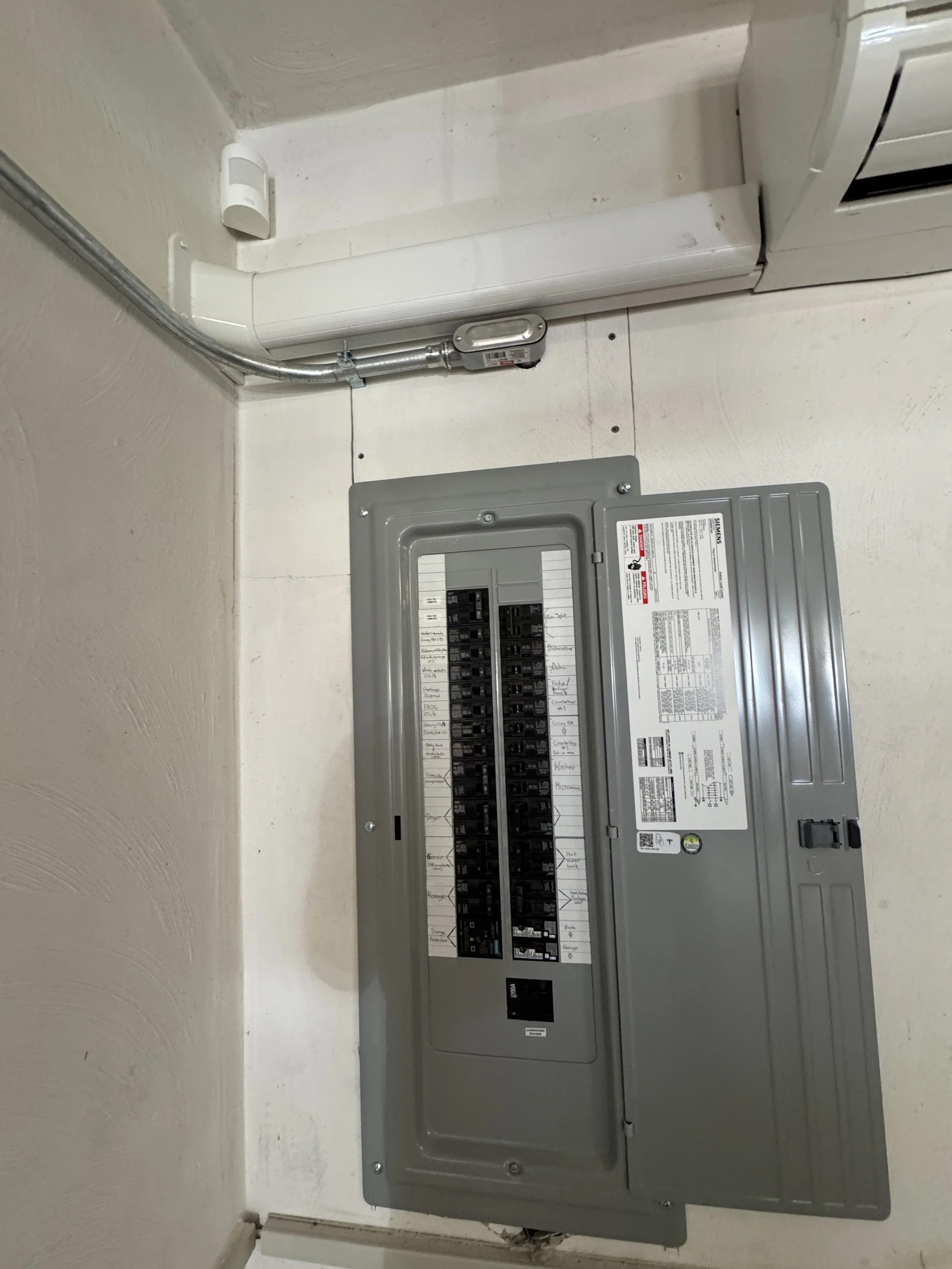 Panel mounted high on an interior wall of a Portsmouth, VA home