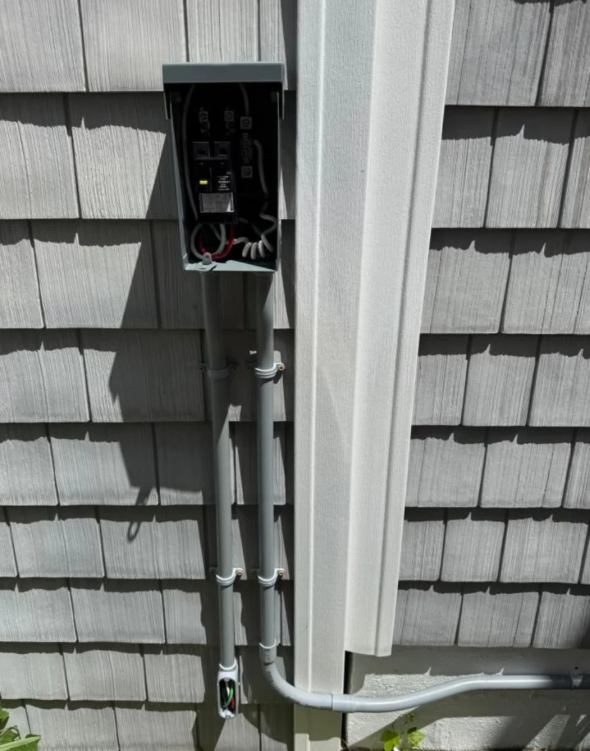 Outdoor enclosure mounted on the wall where a Suffolk, VA circuit is needed