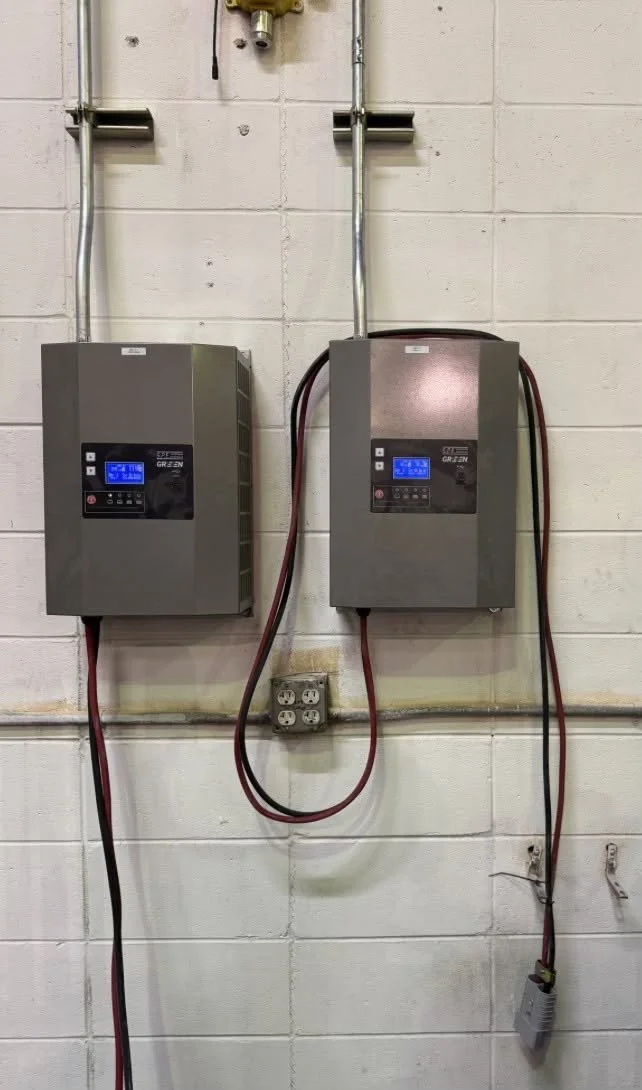 Two wall-mounted battery units side by side with clearance between them, Portsmouth, VA