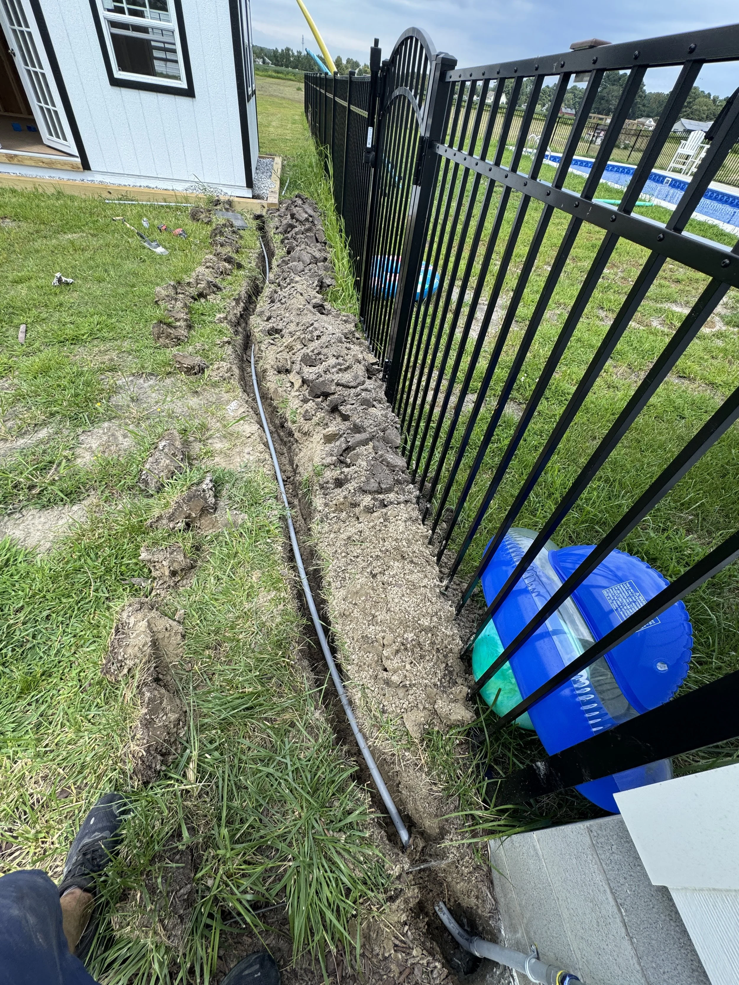 Open trench for a new underground run on a Portsmouth, VA property