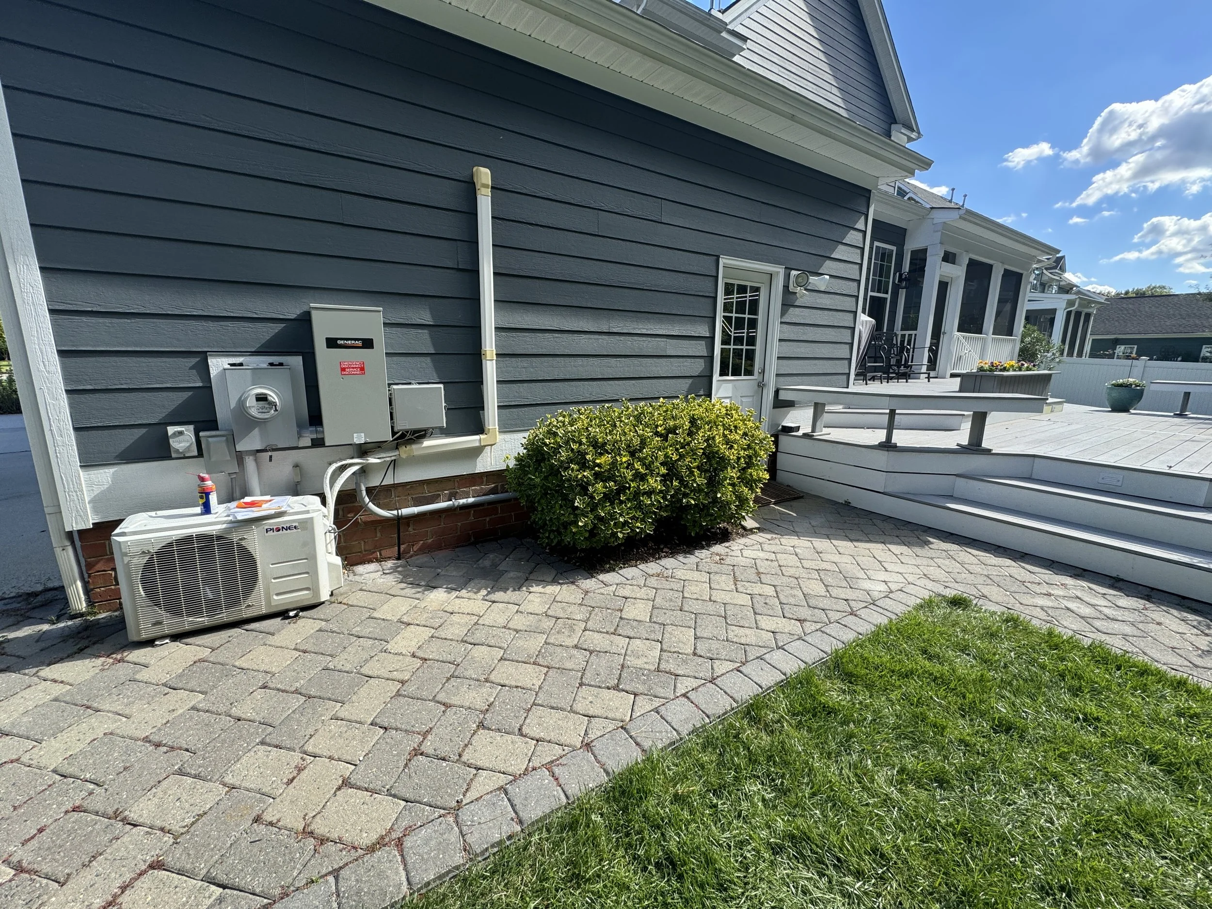 Outdoor equipment along the side yard wall of a Portsmouth, VA home