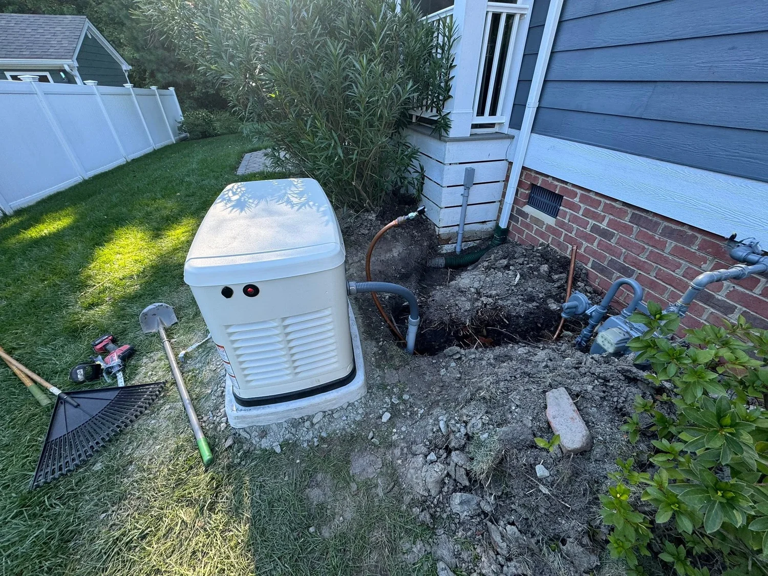 Generac standby generator on a pad