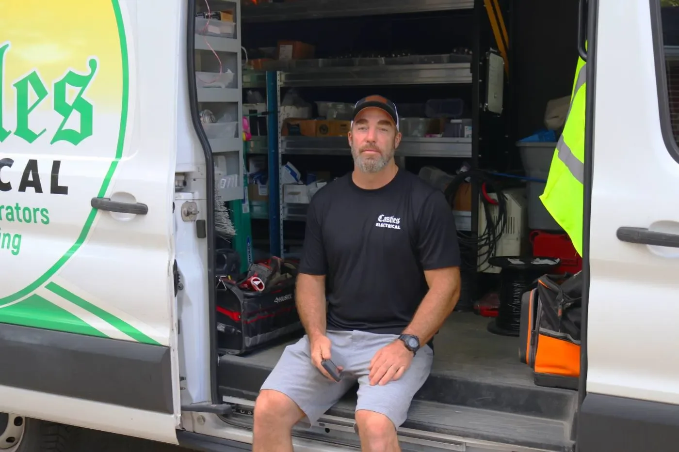 Owner seated at the van