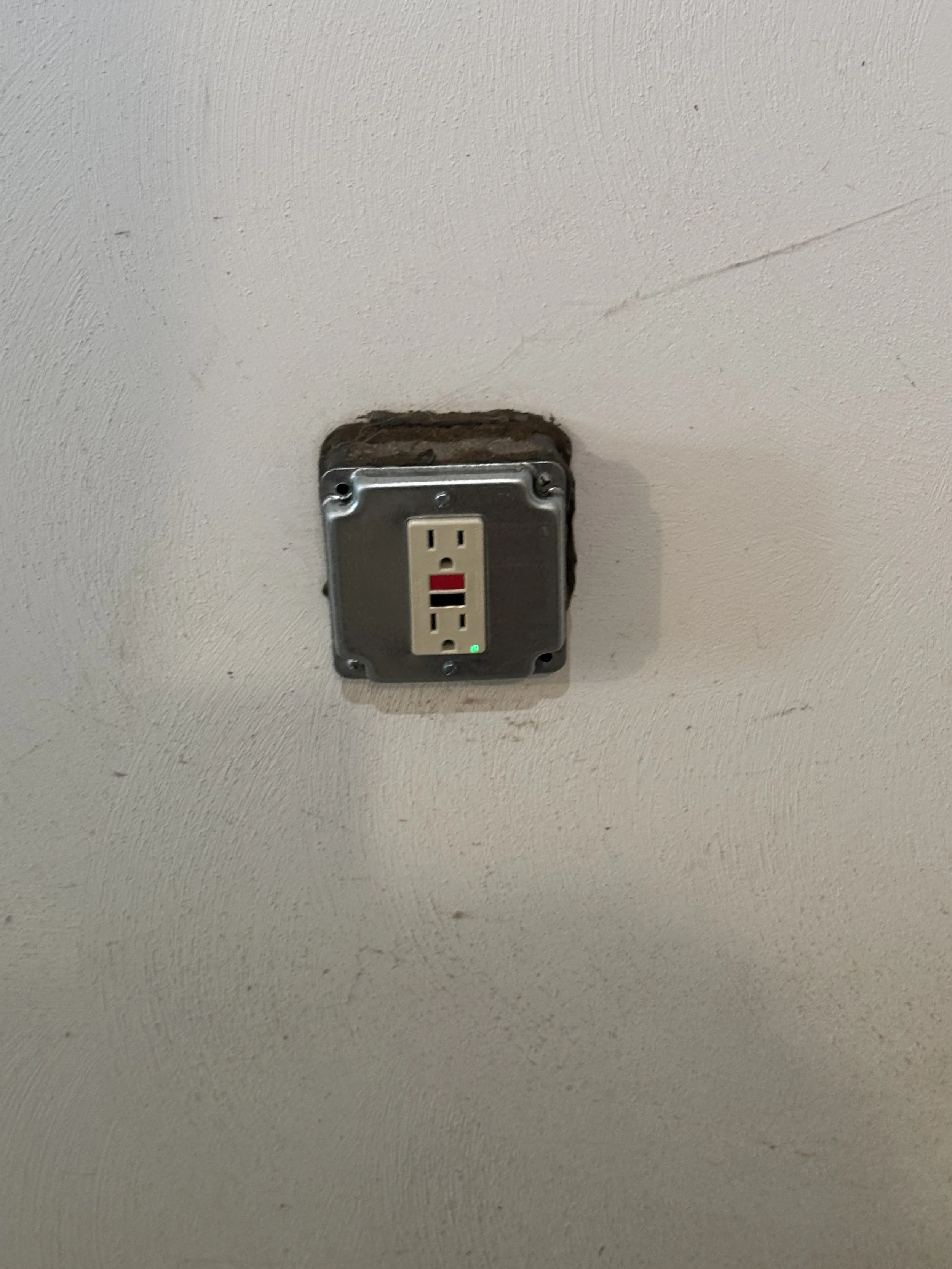 GFCI-protected outdoor receptacle in a weatherproof cover at a Suffolk, VA home