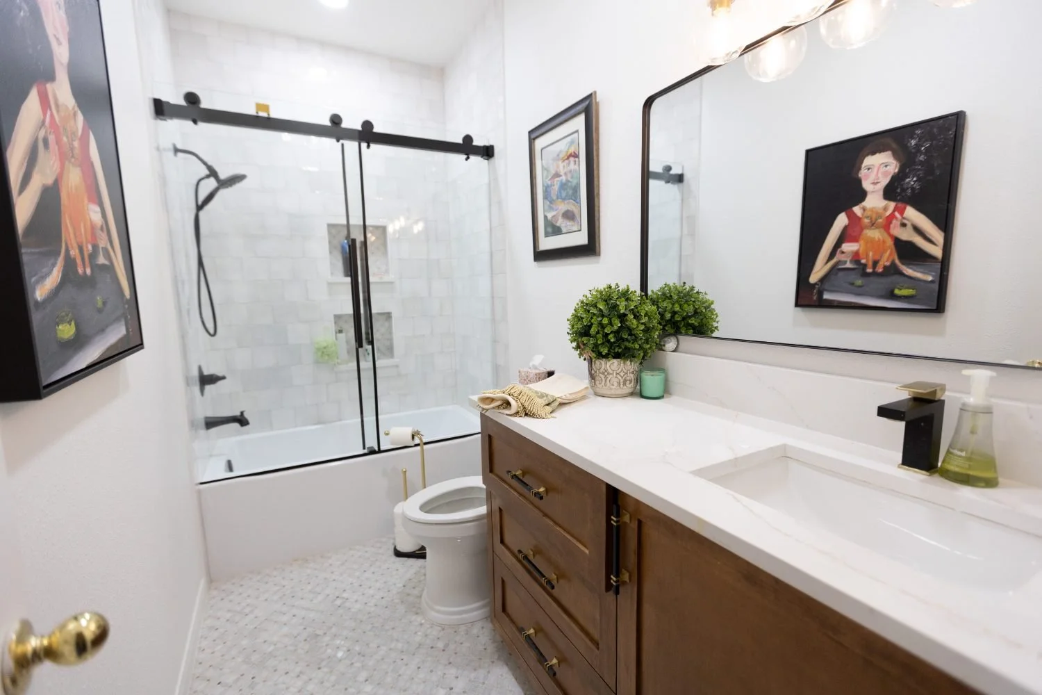 Finished master bathroom by Palacios Construction Group