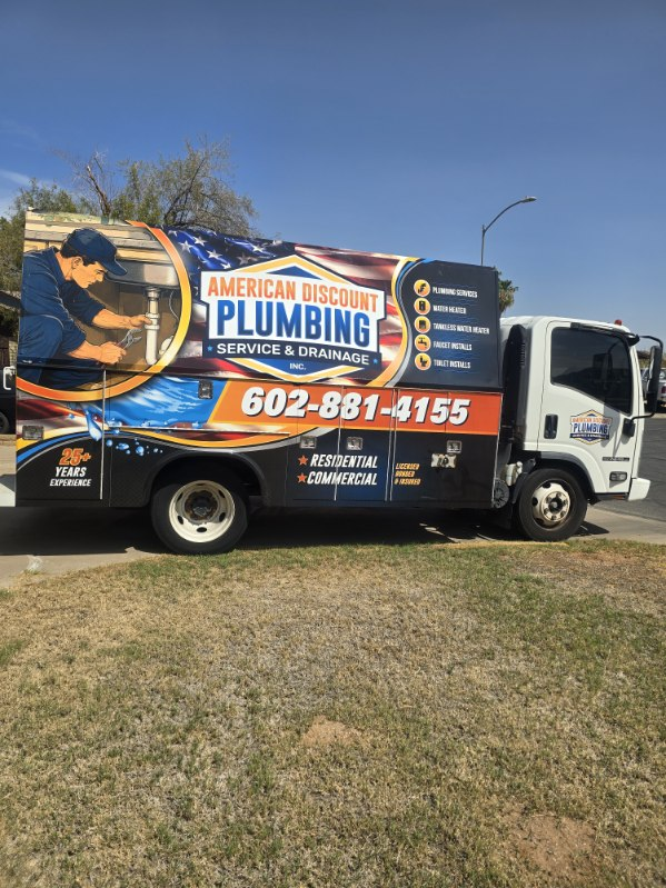 Pavel Farcas at the American Discount Plumbing service truck in Phoenix.
