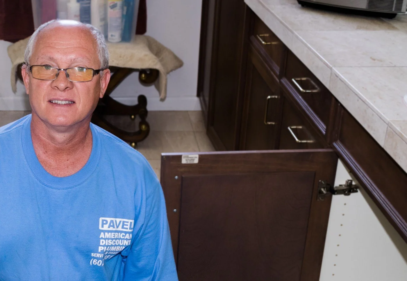 Pavel Farcas of American Discount Plumbing outside a Scottsdale home.