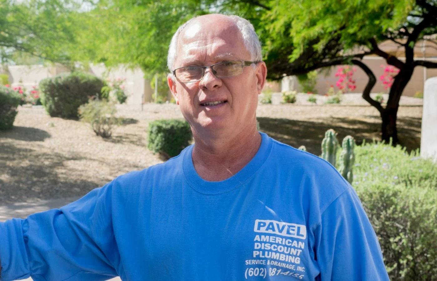 Pavel Farcas of American Discount Plumbing outside a Cave Creek home.