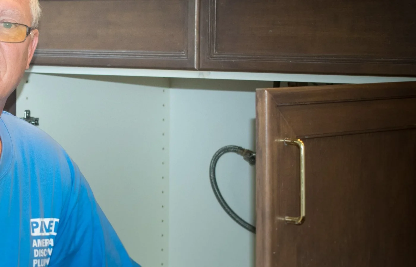 Pavel Farcas replacing a bathroom vanity supply line in a Cave Creek home.