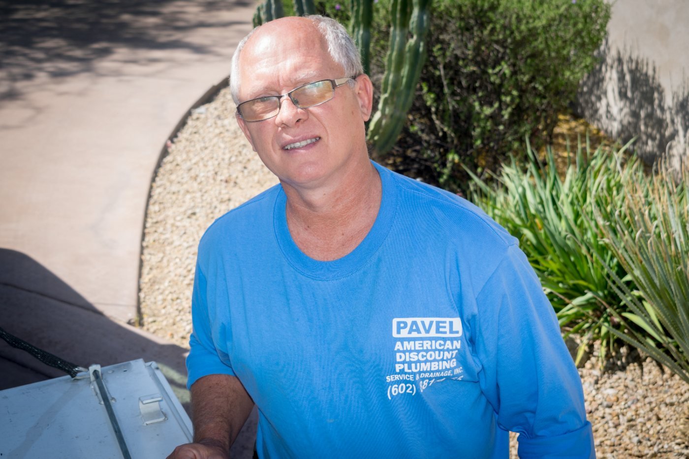Pavel Farcas of American Discount Plumbing outside a Glendale home.