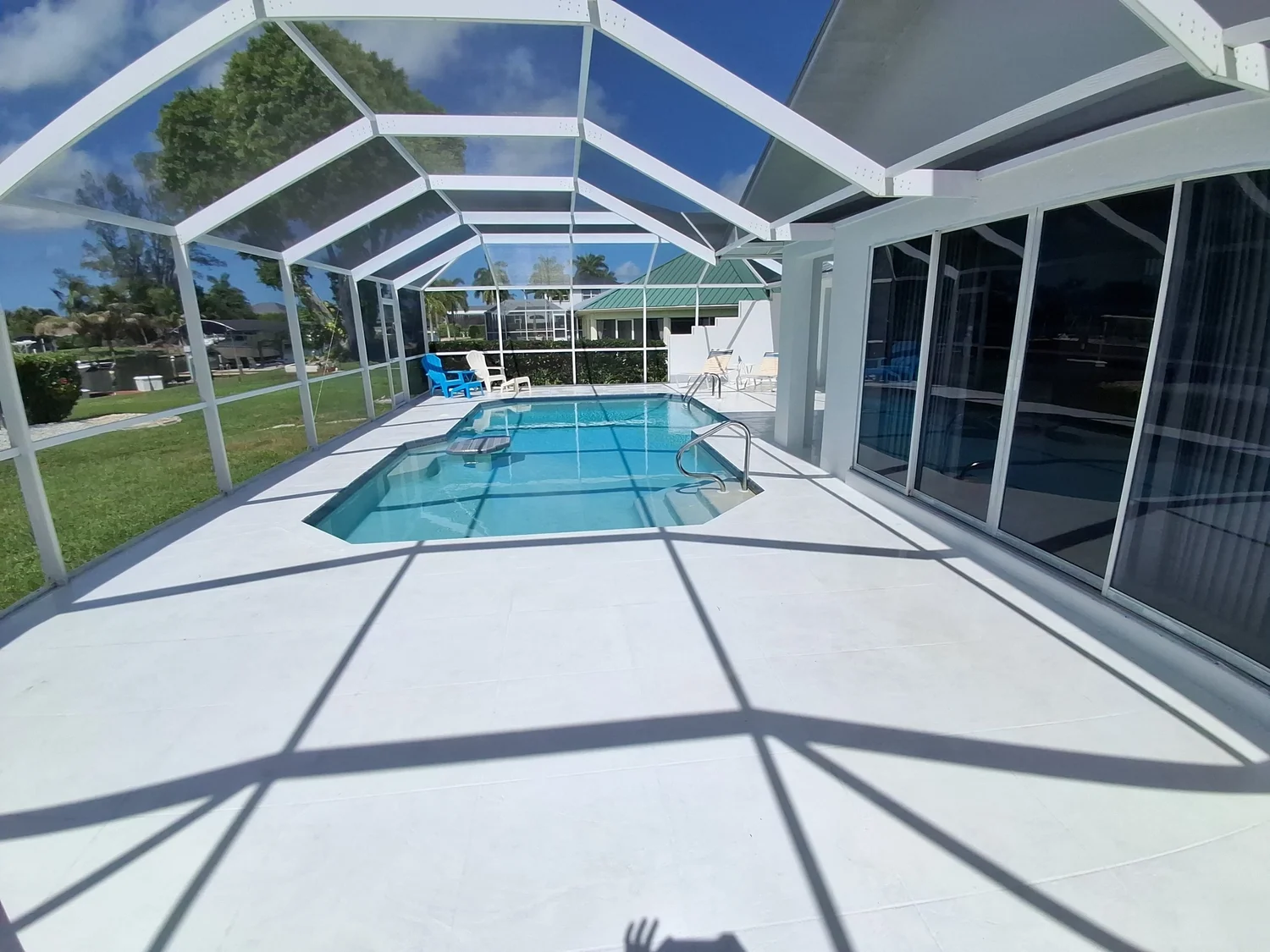 Pool deck and lanai after pressure washing