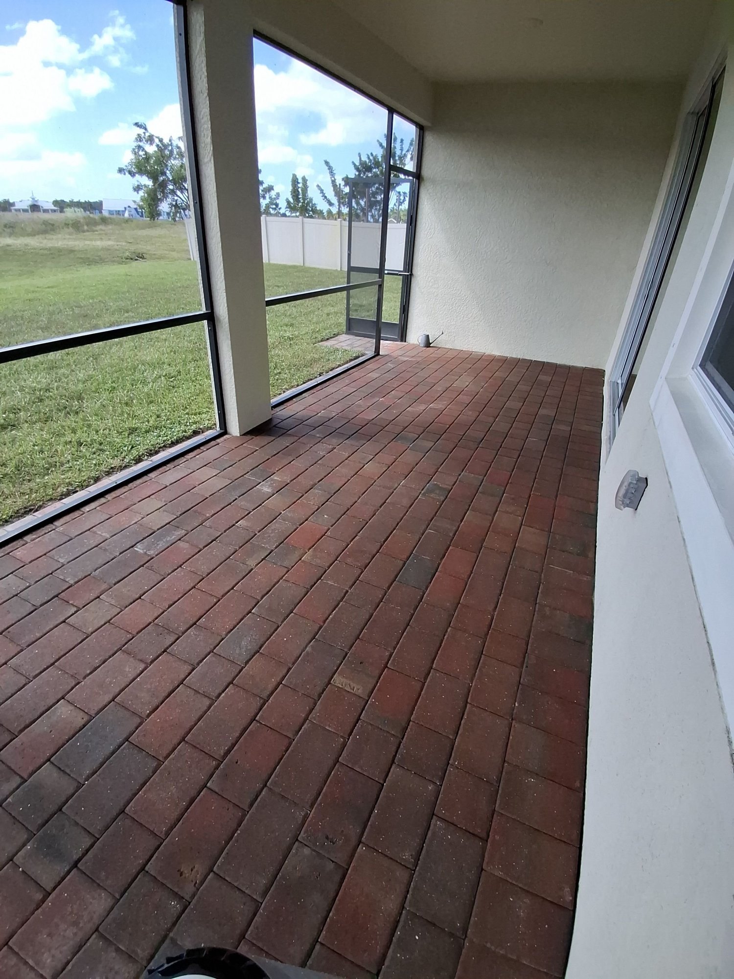 Brick paver lanai after pressure washing