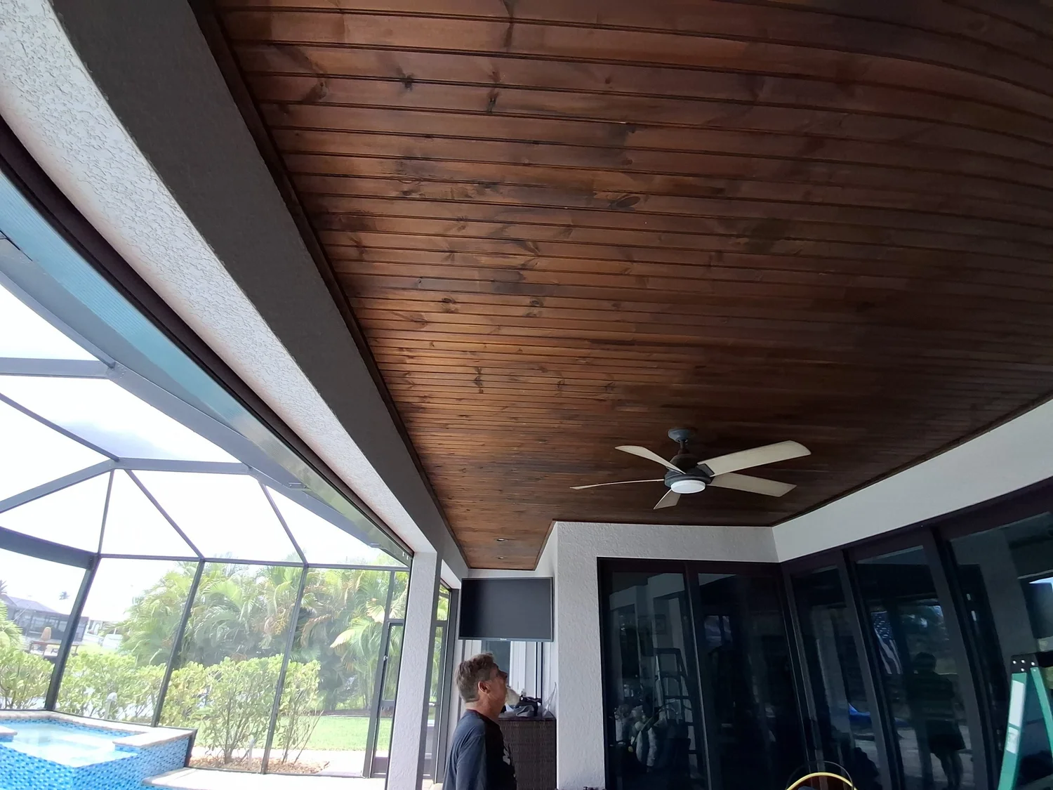 Lanai wood ceiling with ceiling fan