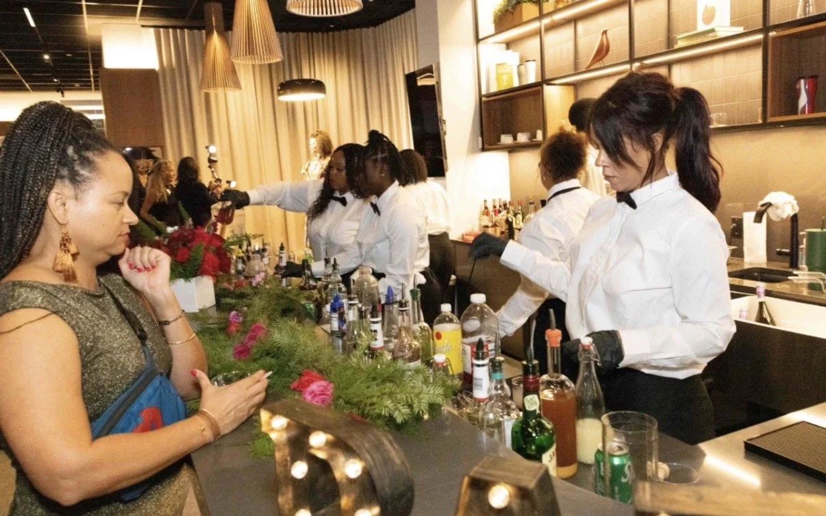 Marti NiNi bartenders serving guests