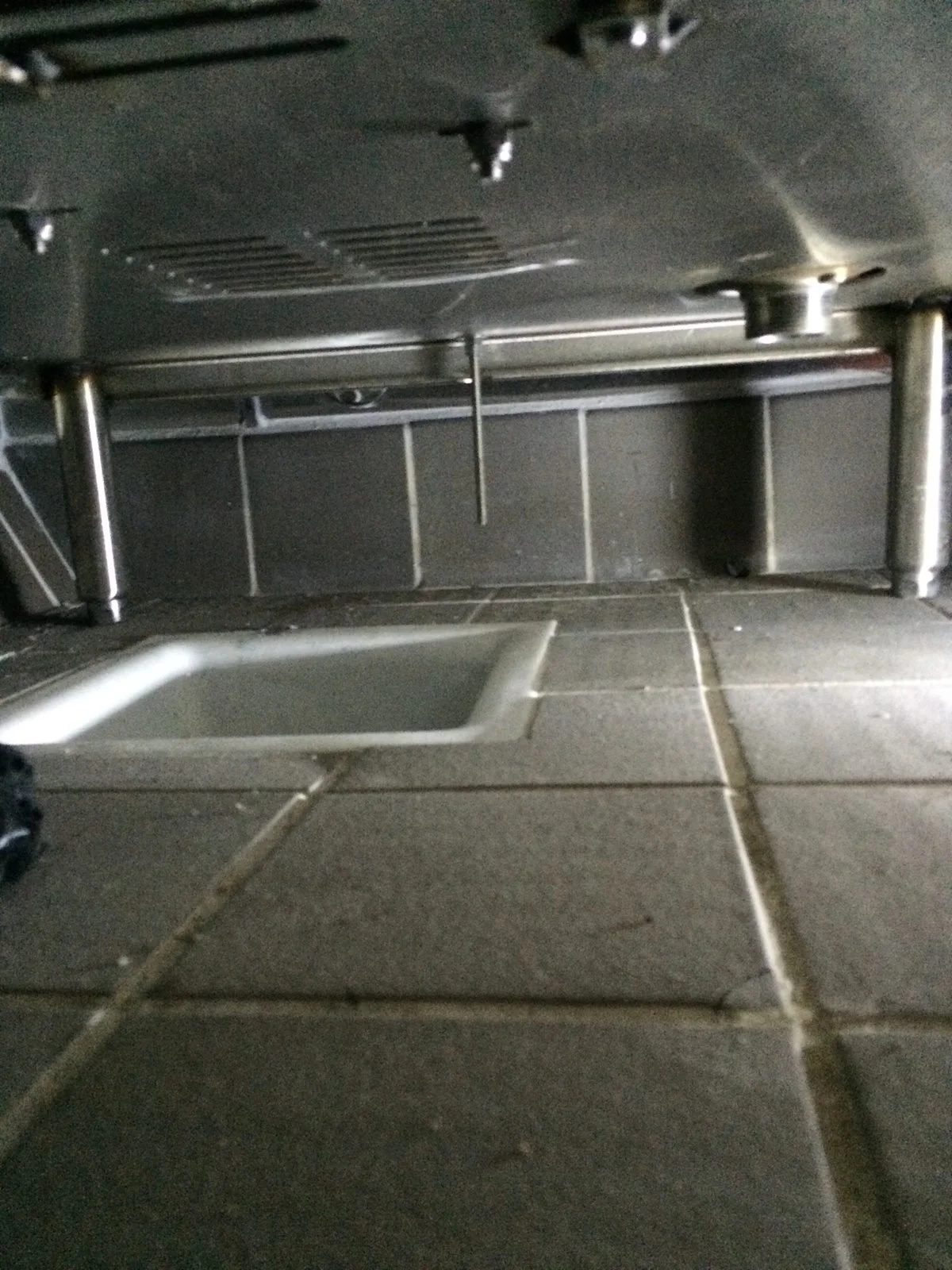 Ser Plumbing technician staging tools in the service van