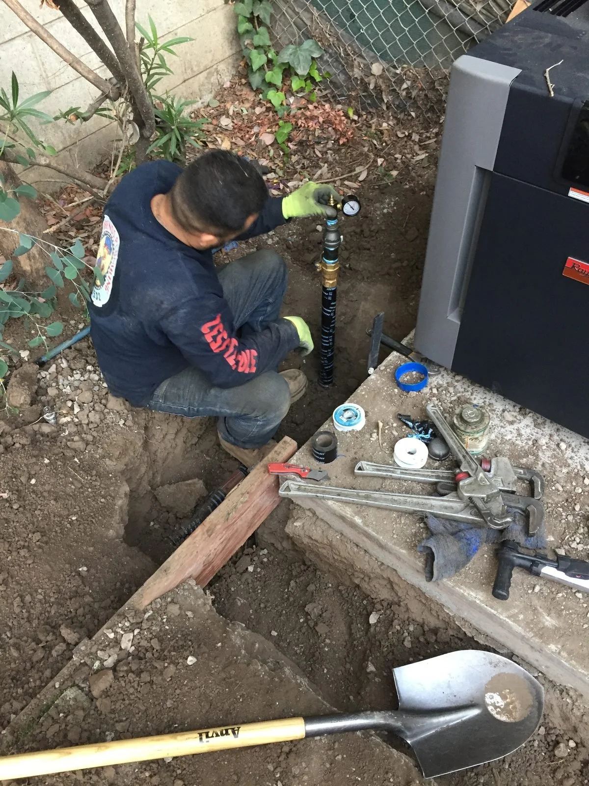Ser Plumbing owner pulling parts from the stocked service van