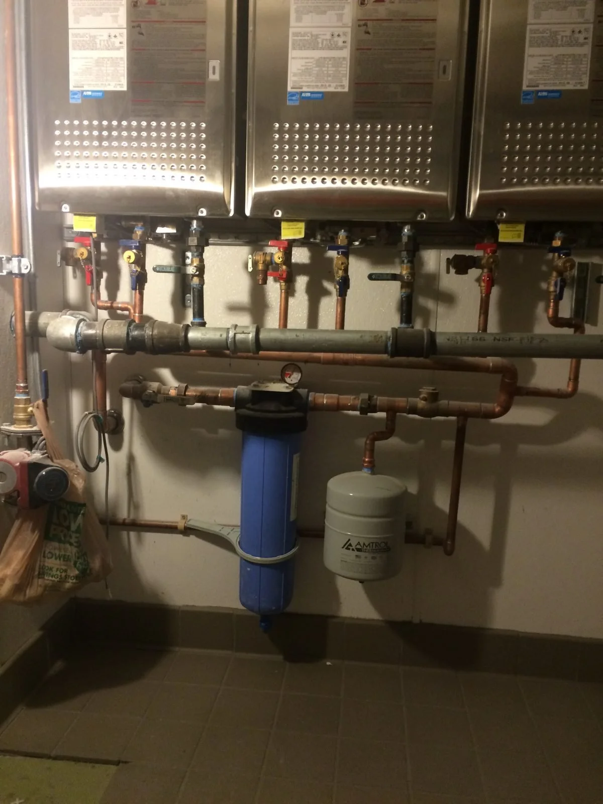 Ser Plumbing commissioning a tankless unit in Southeast LA County