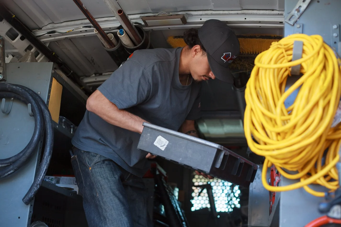 Ser Plumbing technician documenting findings on a service call
