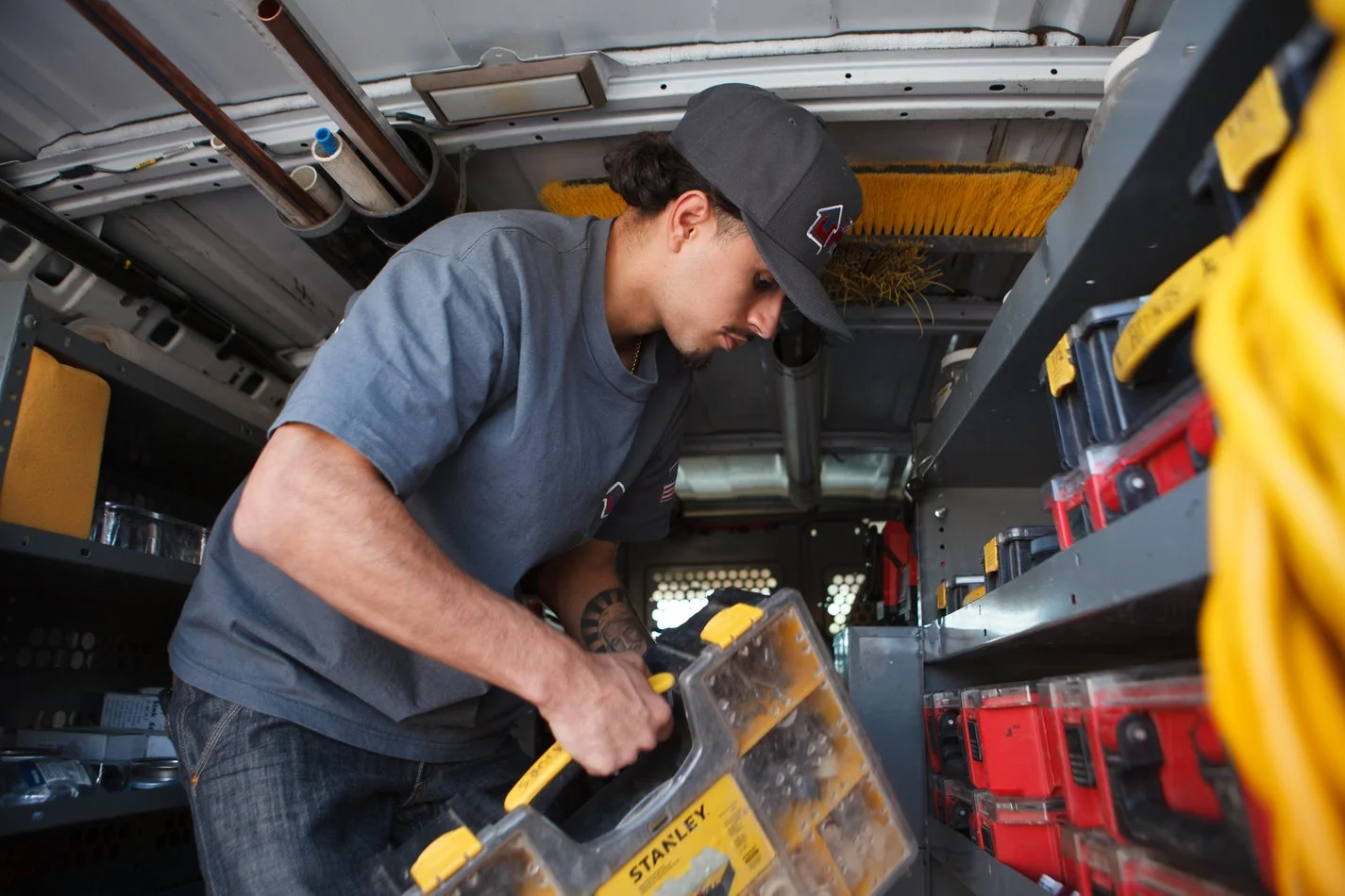 Ser Plumbing technician documenting findings on a service call