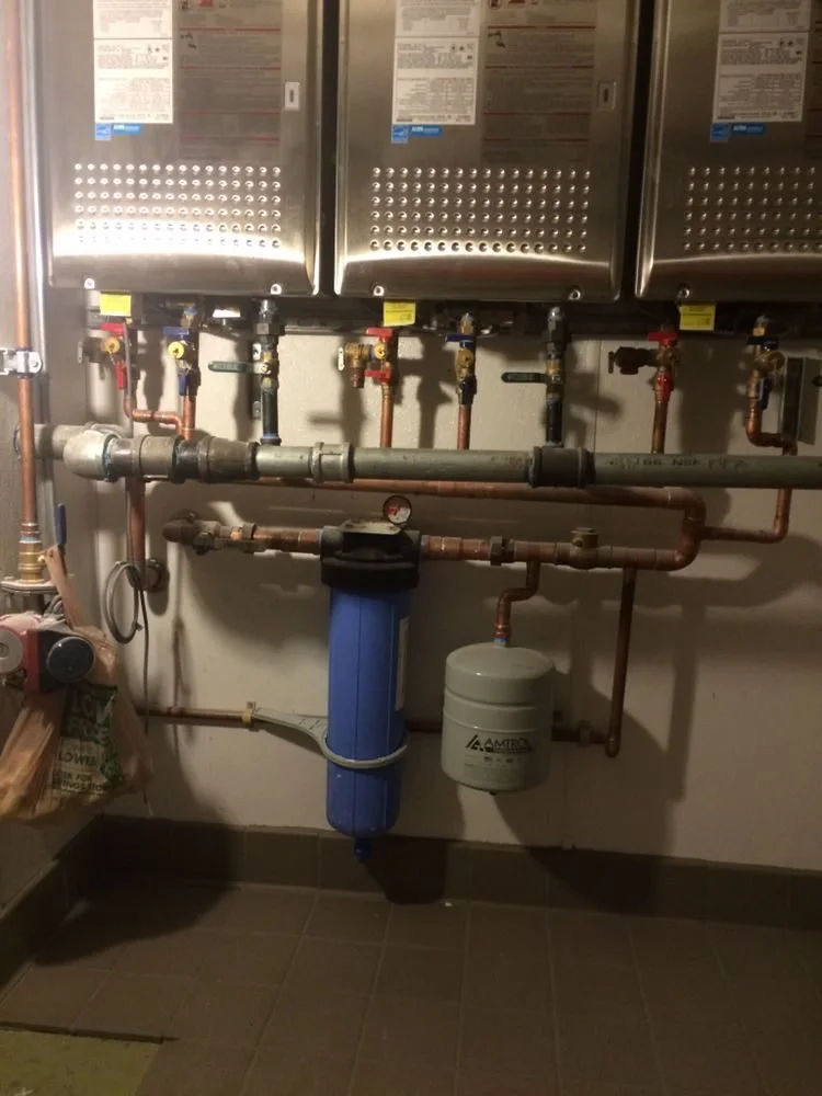 Ser Plumbing plumber at work on a Southeast LA County job