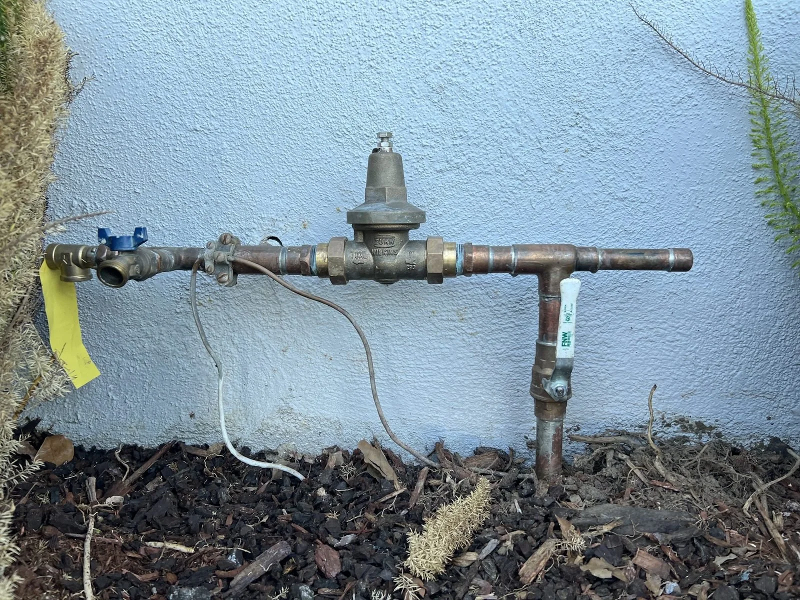 Ser Plumbing plumber working at the van shelving in SE LA County