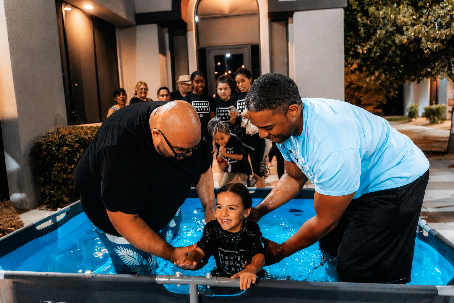 Child water baptism at Overflow Church