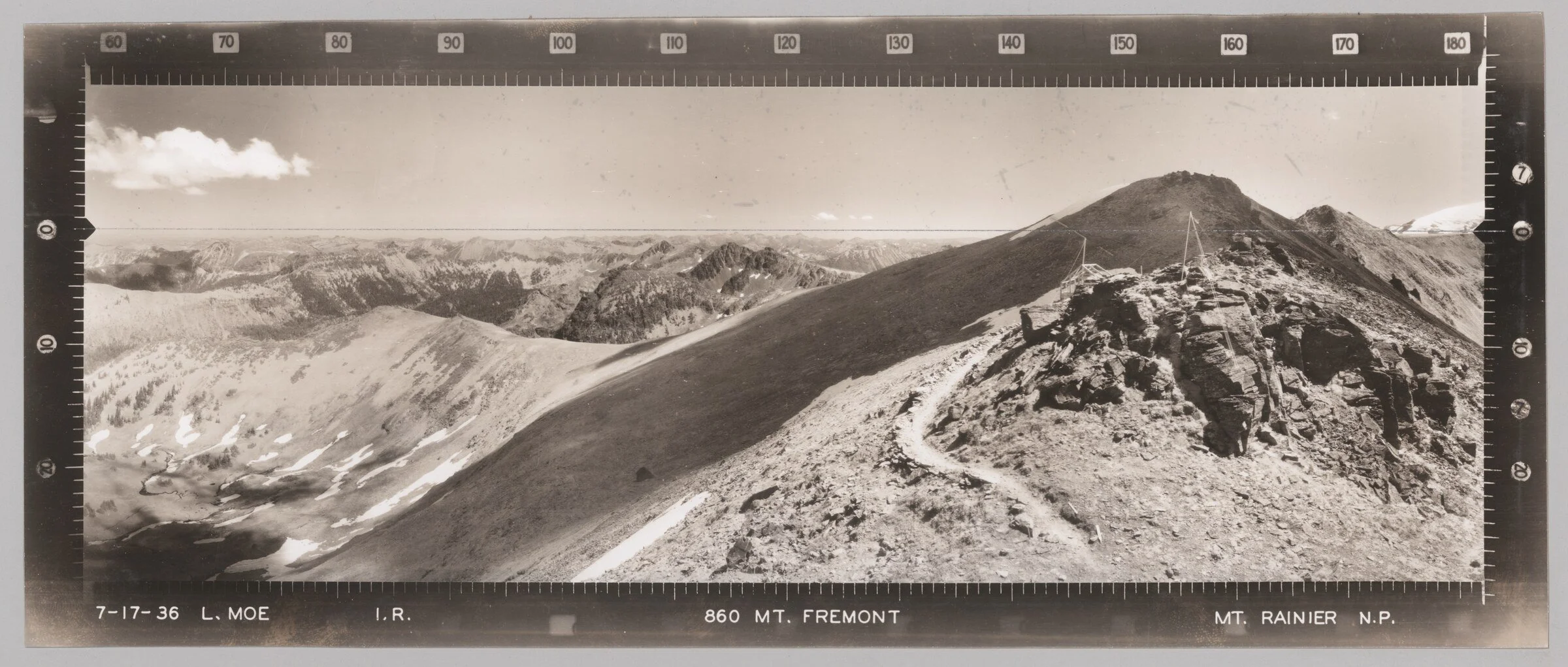 Infrared panoramic photograph numbered 860 from Mount Fremont, dated July 17, 1936, showing mountain ridges and part of the lookout structure beneath an azimuth scale from 60 to 180 degrees.