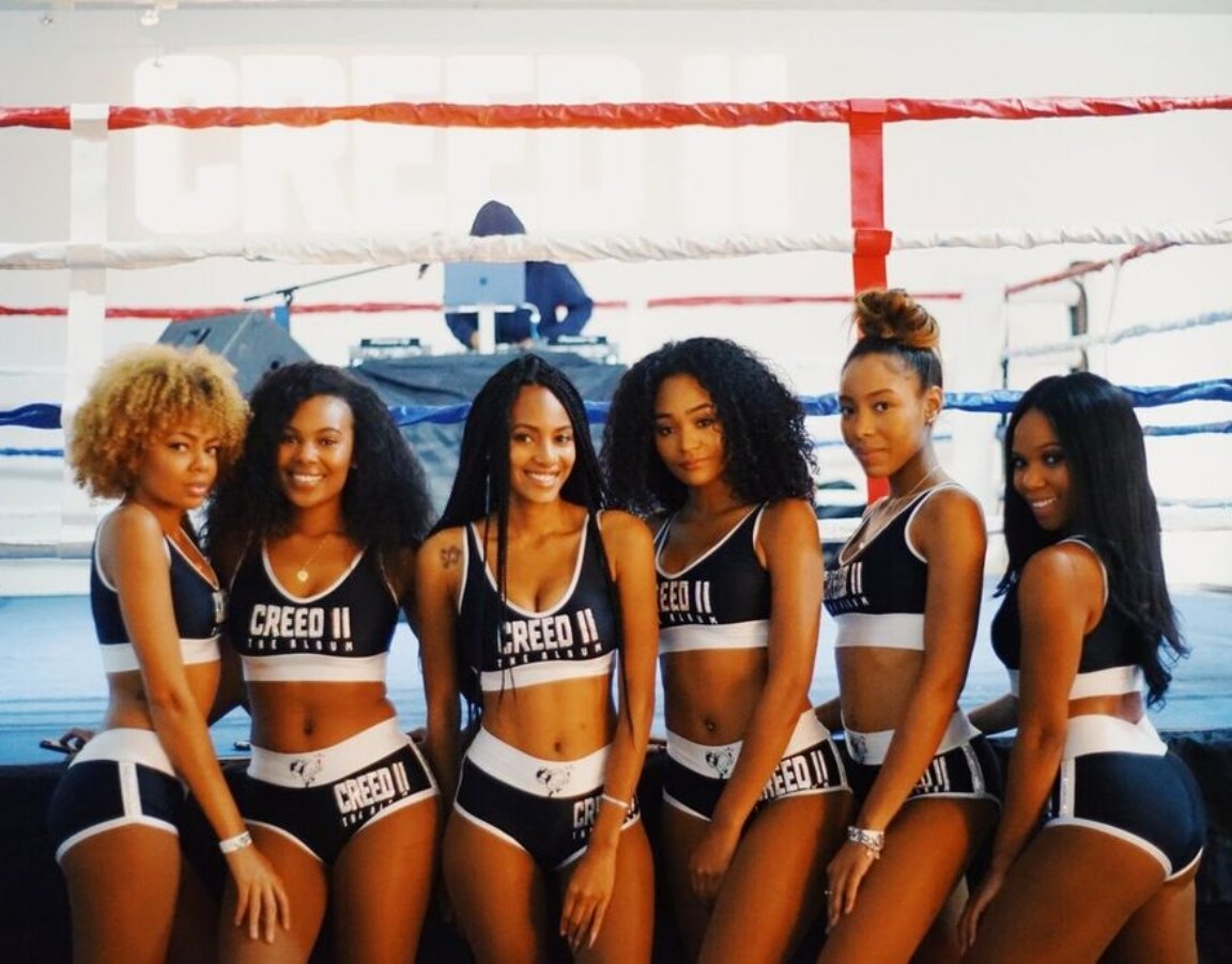 Creed II activation models wearing branded apparel