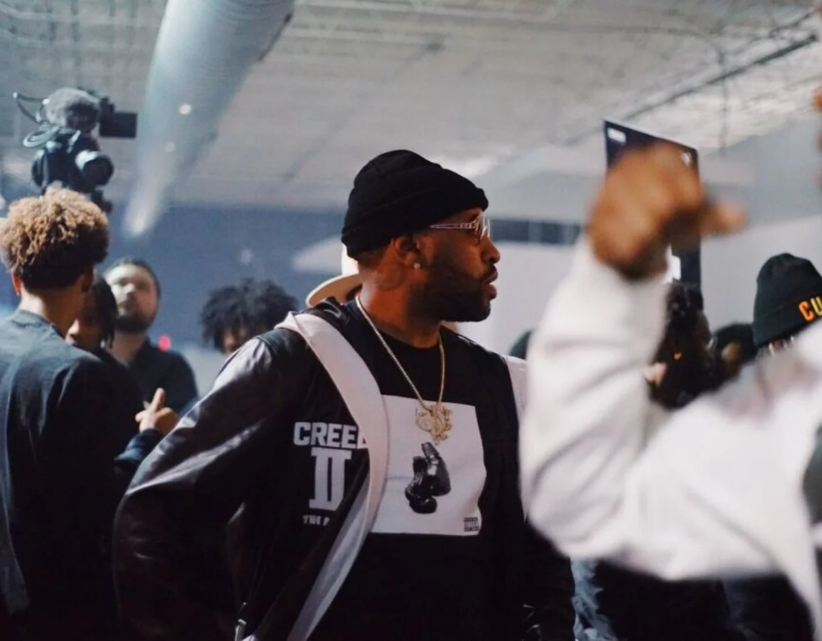 Mike WiLL Made-It wearing the Creed II robe