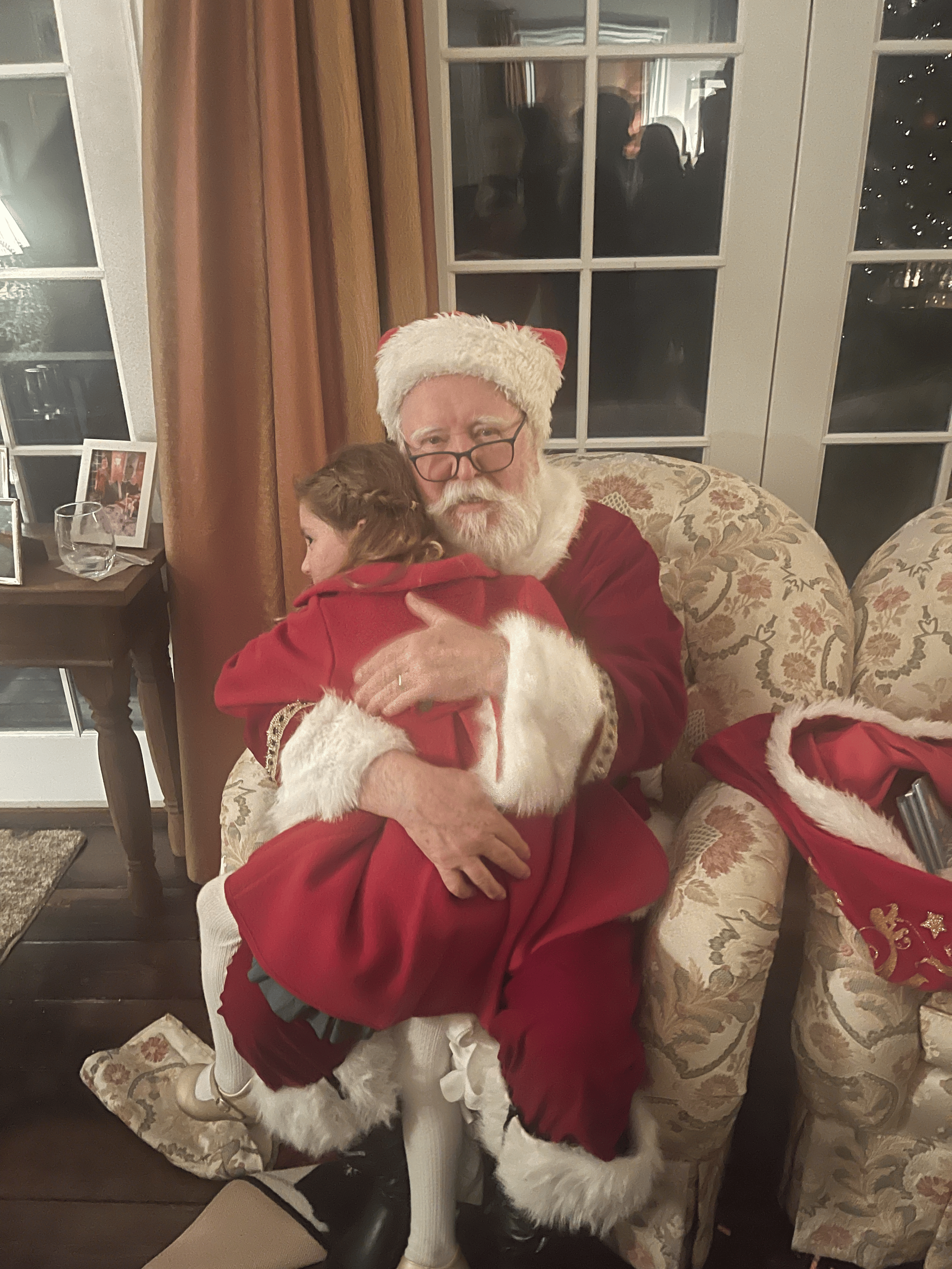 Brother Claus visiting a child in hospital