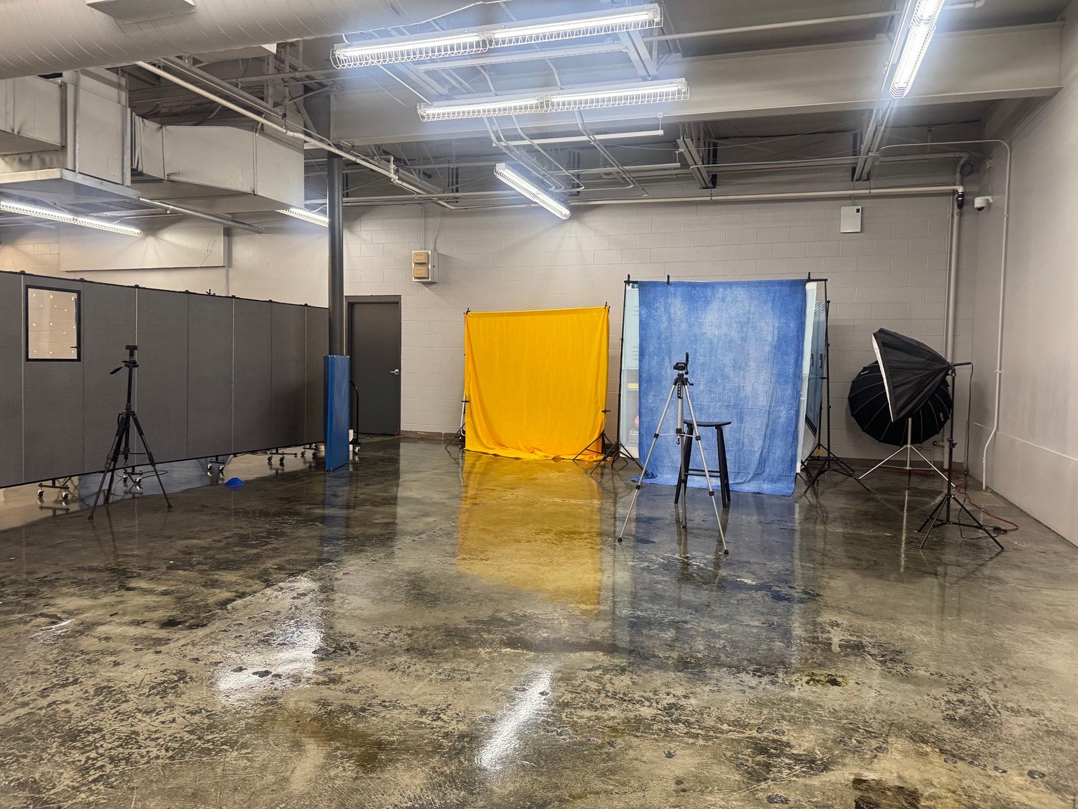Backdrops, camera tripods and lighting set up for photography at Allen Village High School