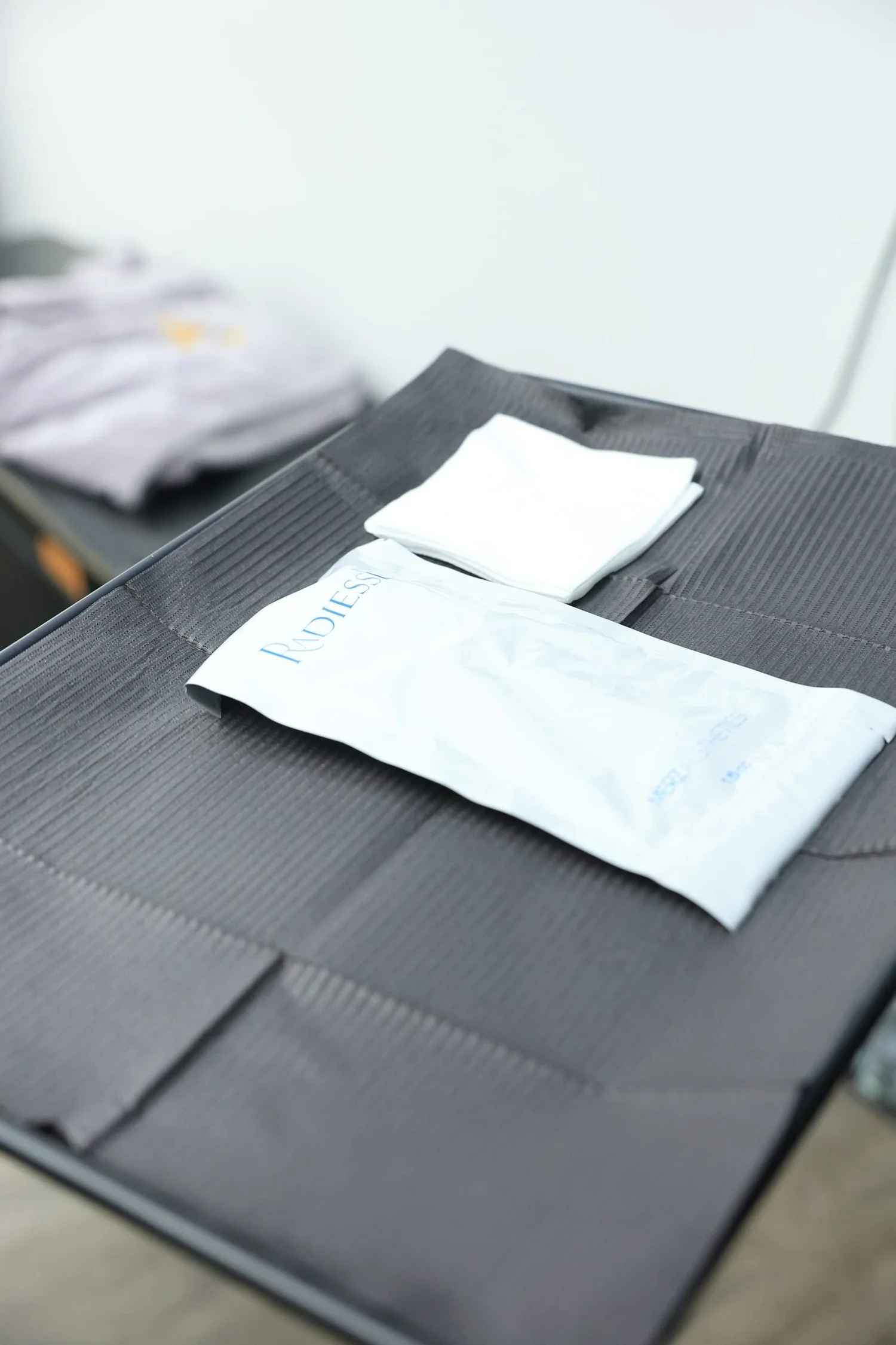 Procedure tray prepared with gauze and a sealed product pouch