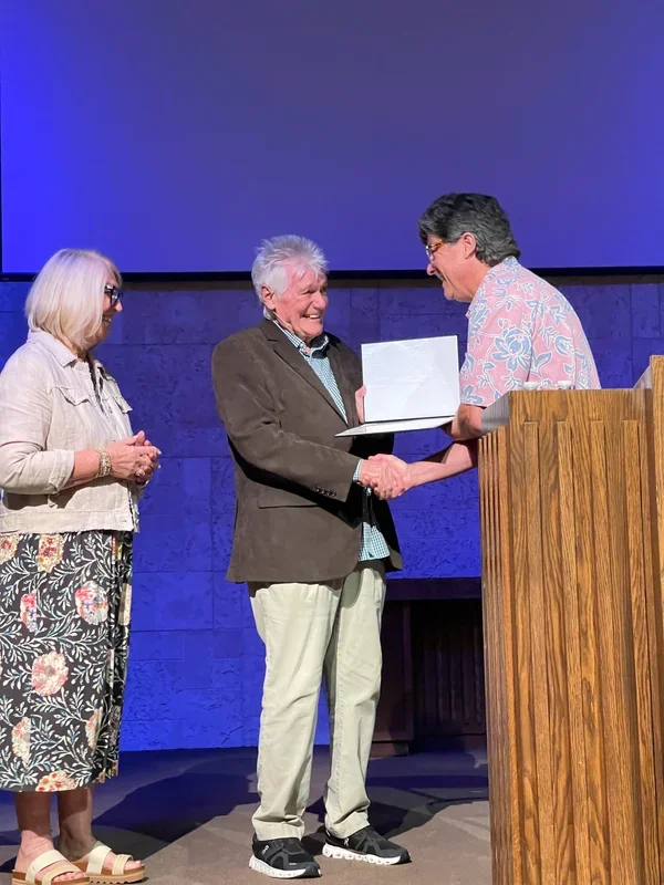 Malcolm Wild receives a certificate at Calvary Chapel Merritt Island.