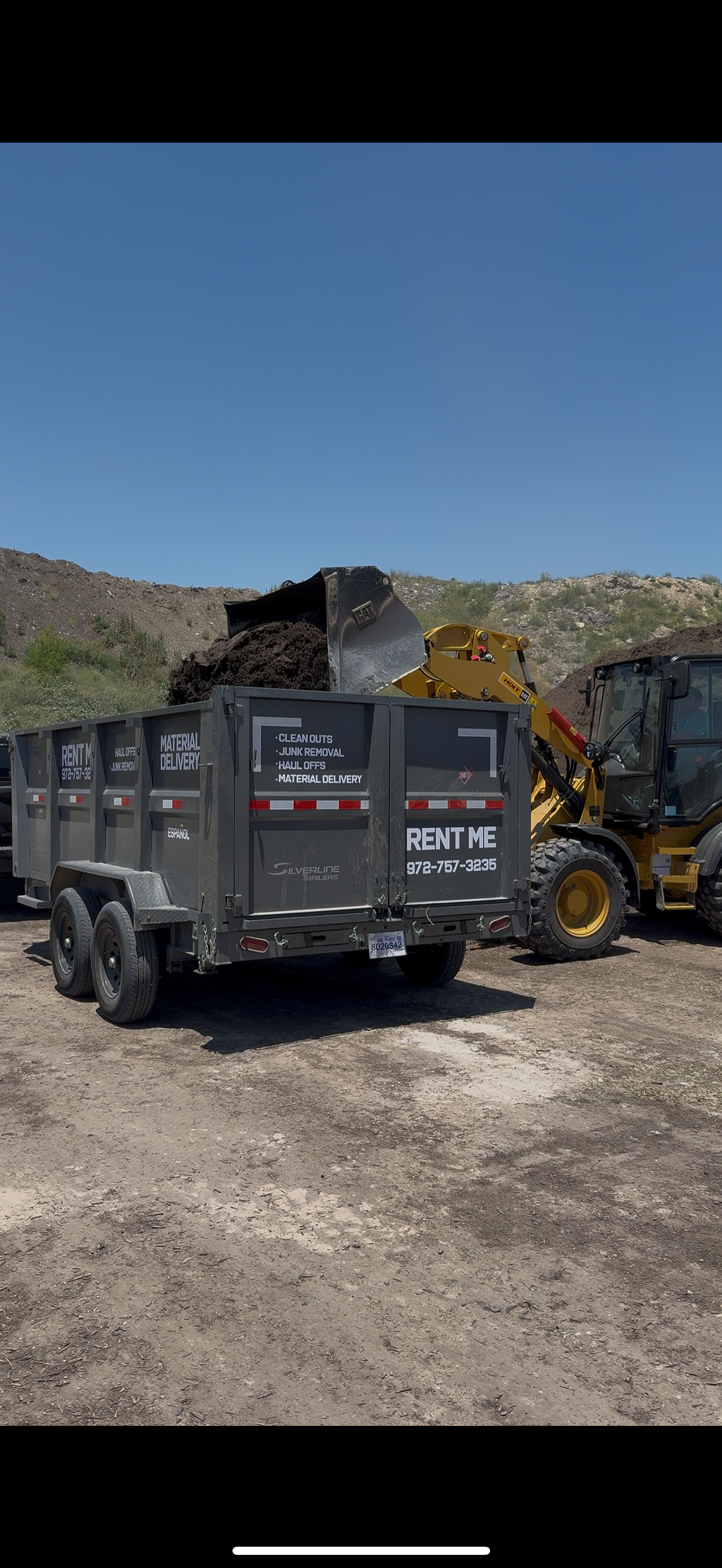 Material delivery with gravel being poured