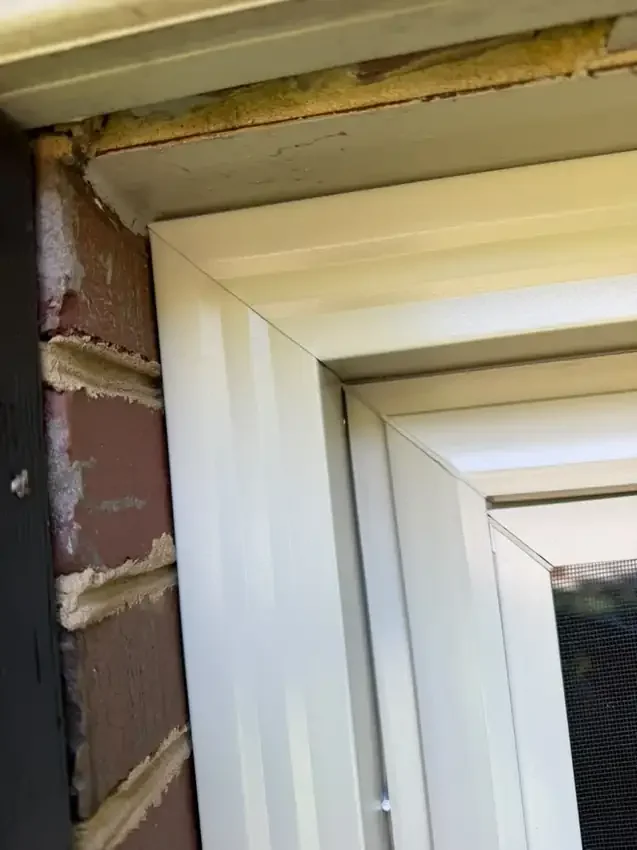 Close-up of a precise 45-degree exterior trim miter before final finishing