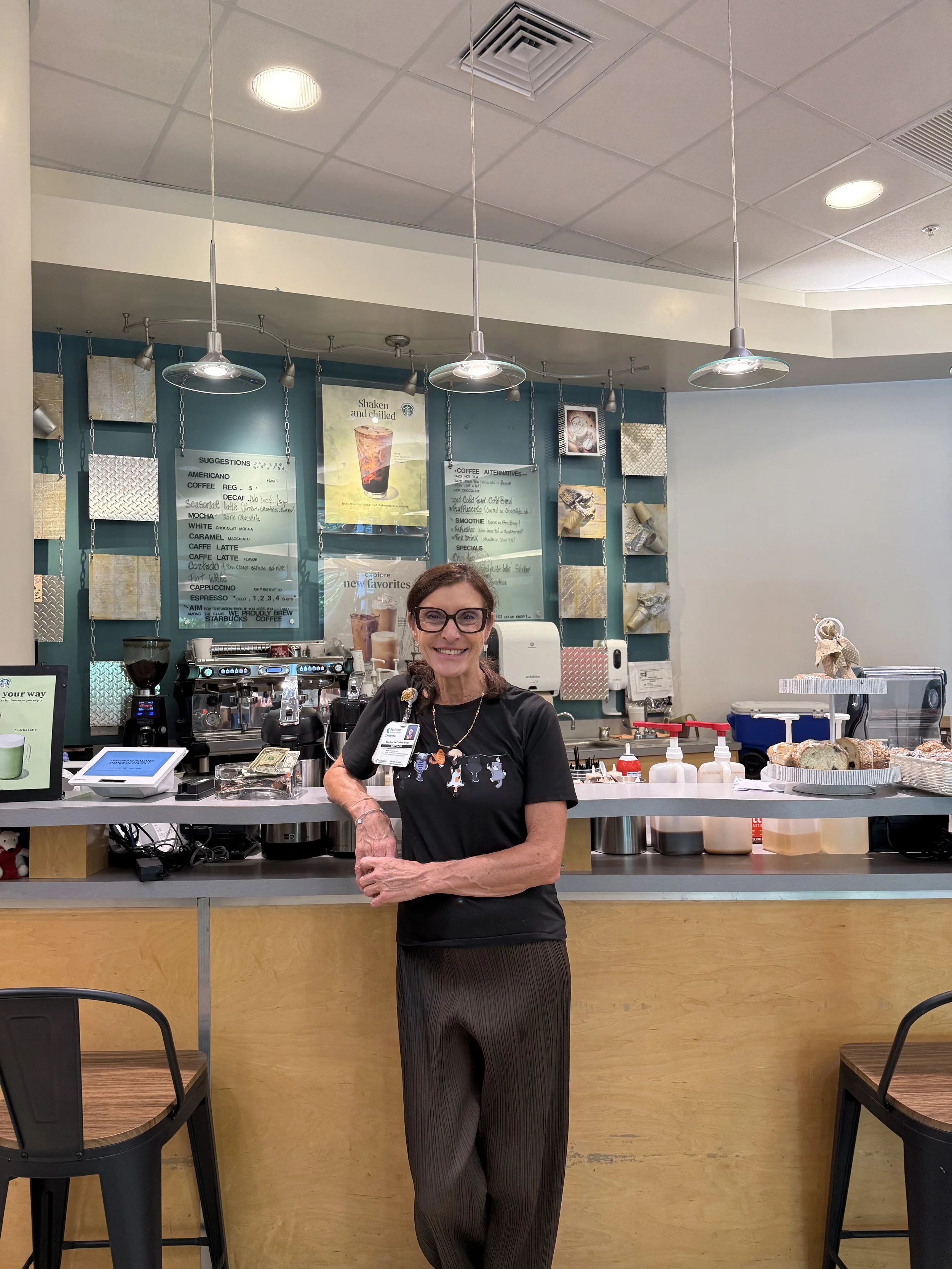 Mona Charlie Coffee Corner owner at the coffee shop