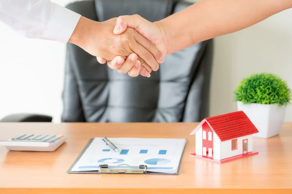 Investor signing property contract
